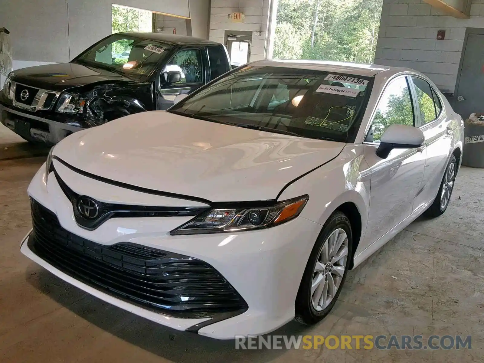 2 Photograph of a damaged car 4T1B11HK7KU247217 TOYOTA CAMRY 2019