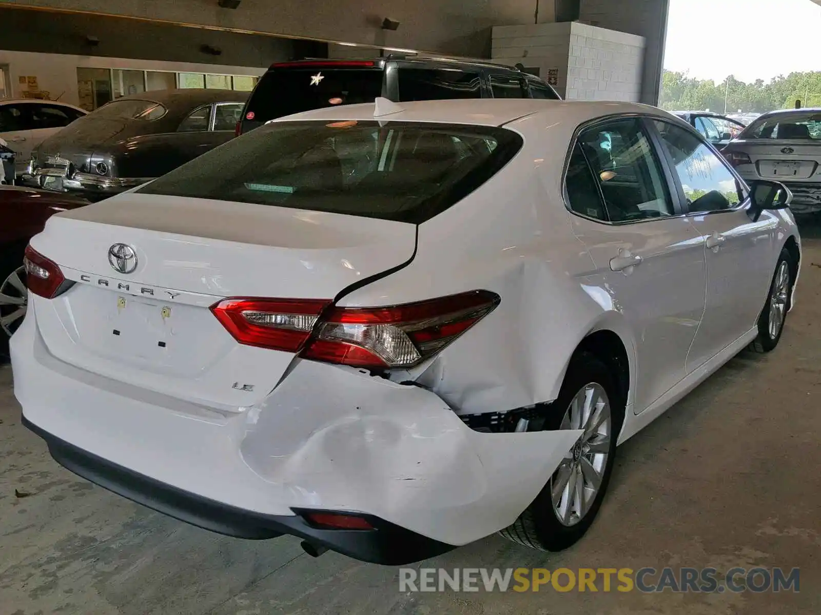 4 Photograph of a damaged car 4T1B11HK7KU247217 TOYOTA CAMRY 2019