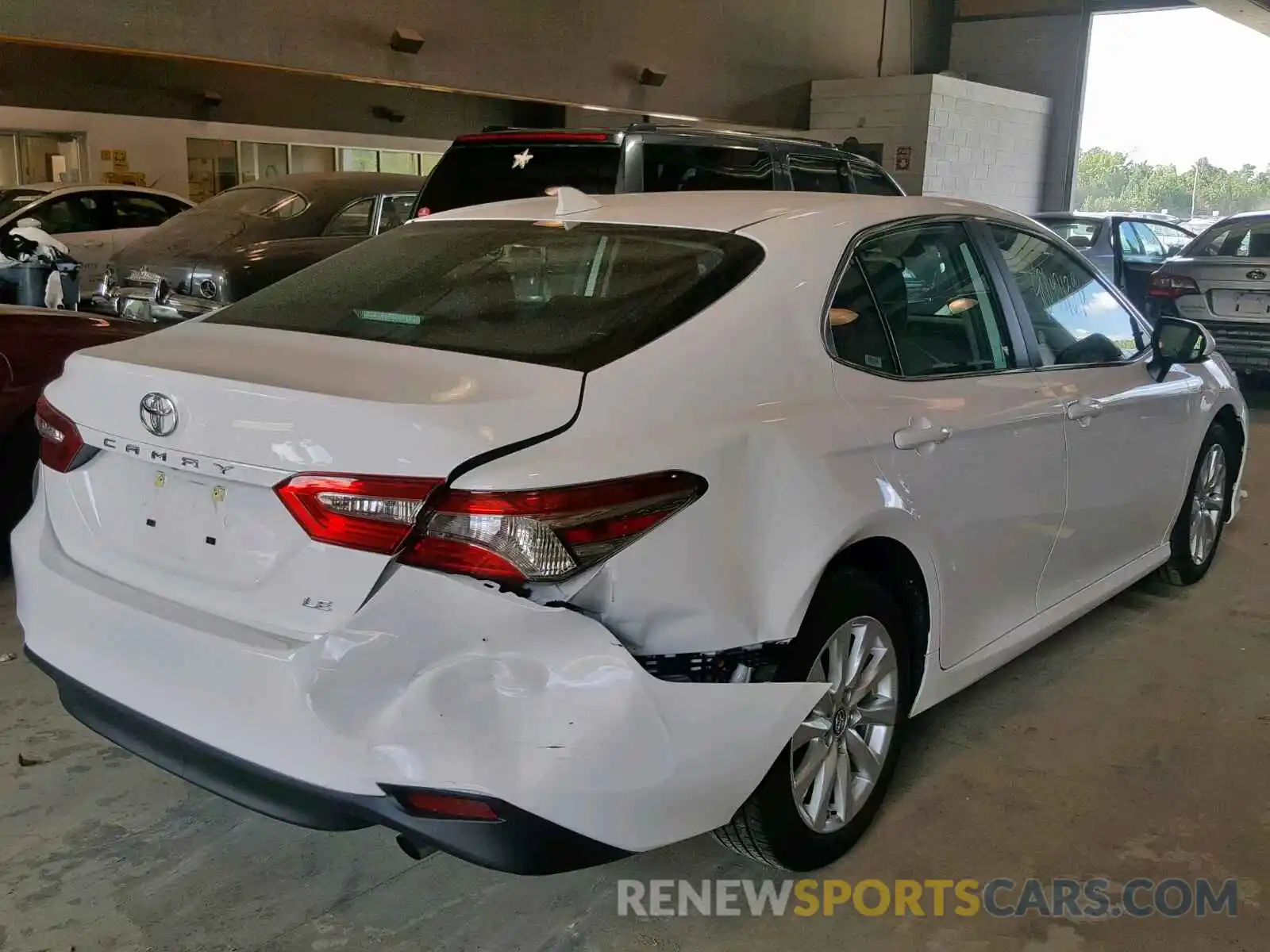 9 Photograph of a damaged car 4T1B11HK7KU247217 TOYOTA CAMRY 2019