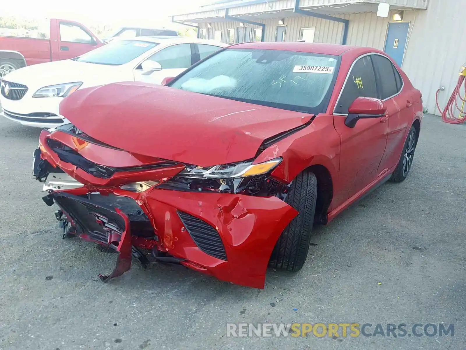 2 Photograph of a damaged car 4T1B11HK7KU251235 TOYOTA CAMRY 2019