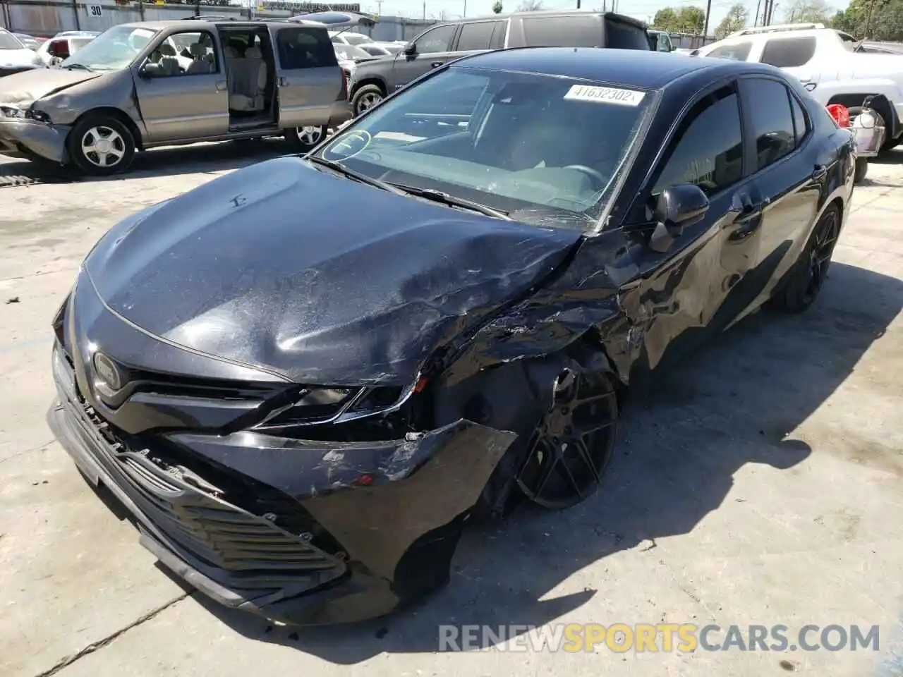 2 Photograph of a damaged car 4T1B11HK7KU255561 TOYOTA CAMRY 2019