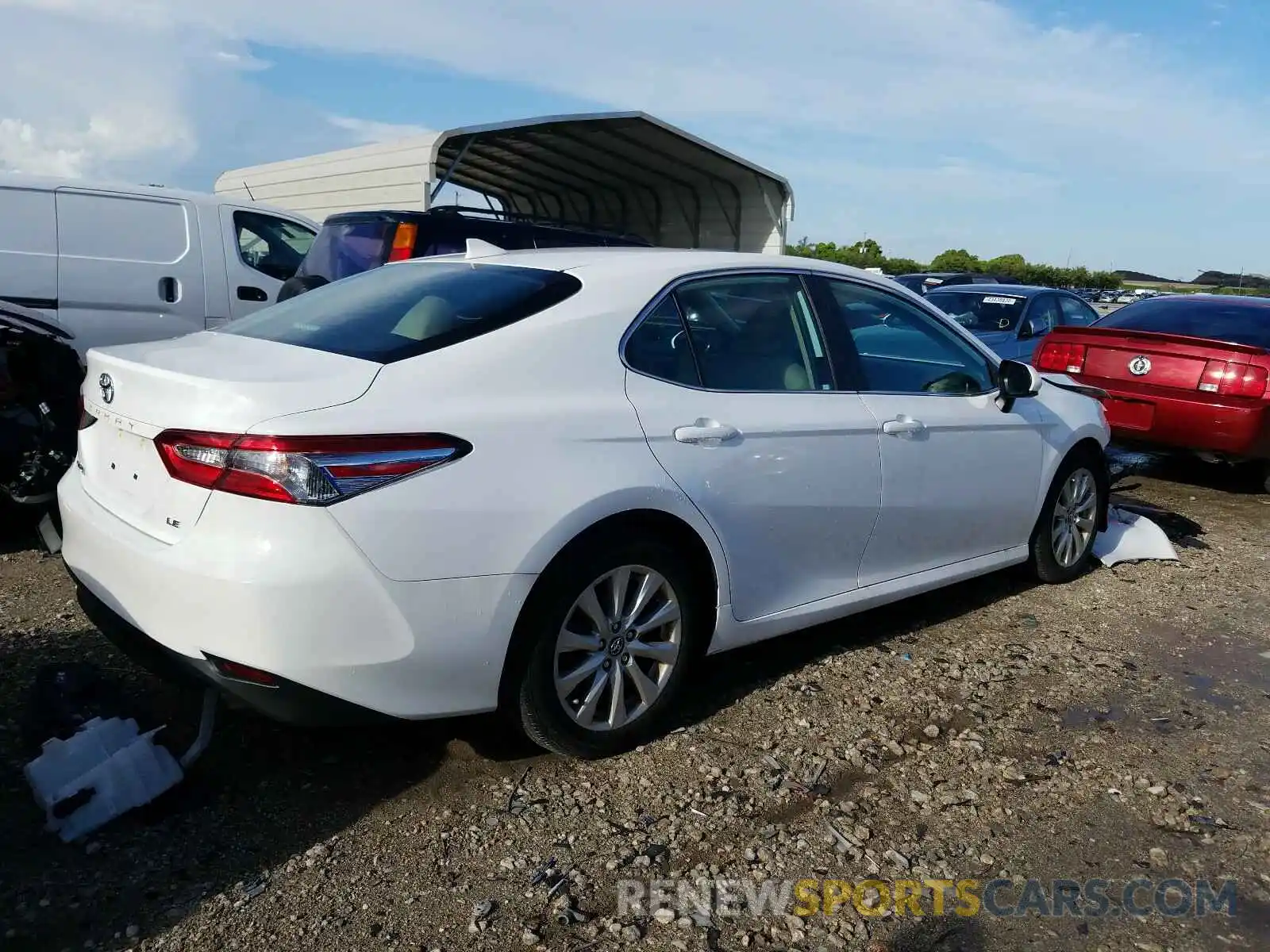 4 Photograph of a damaged car 4T1B11HK7KU256225 TOYOTA CAMRY 2019