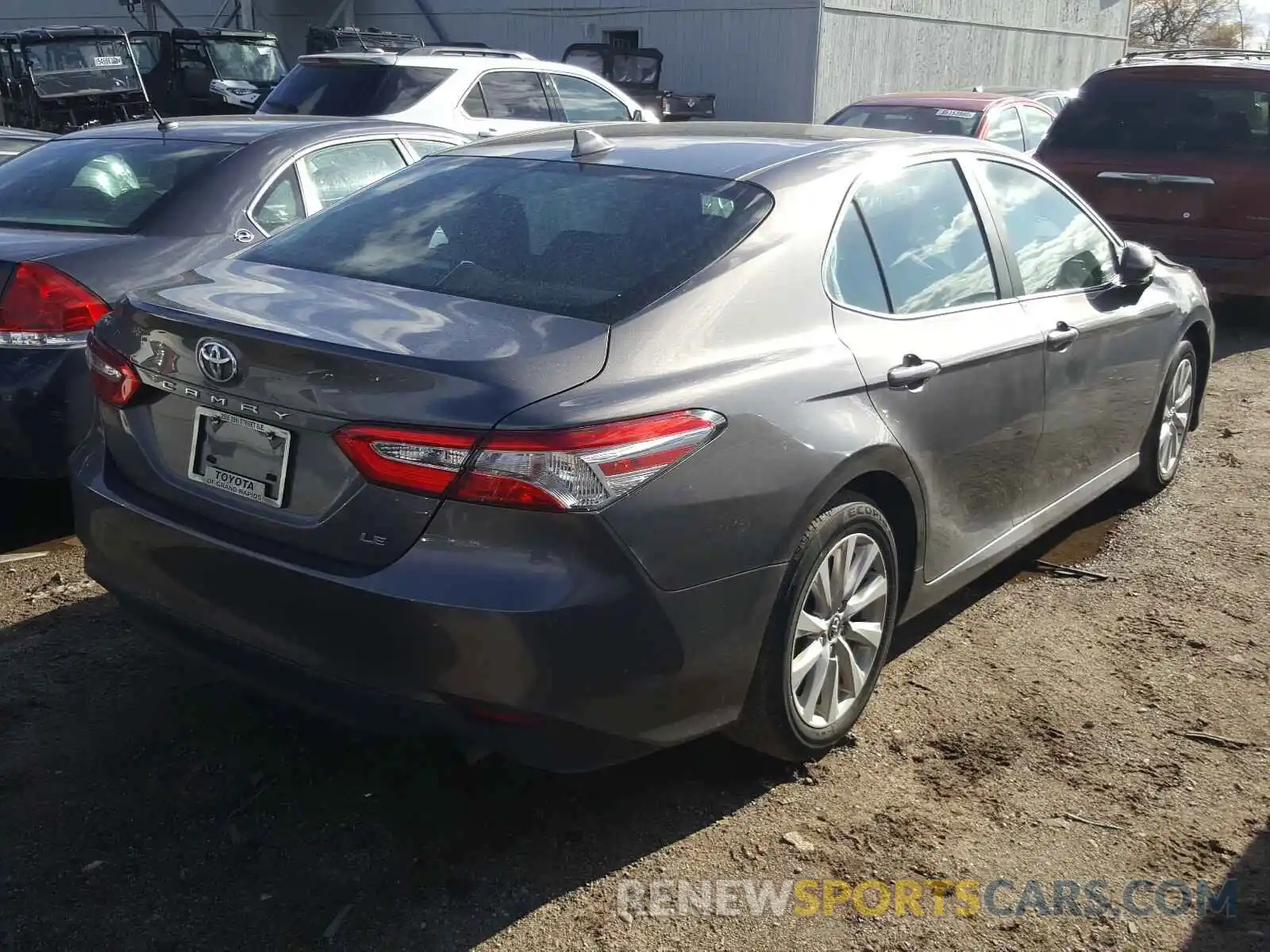 4 Photograph of a damaged car 4T1B11HK7KU260646 TOYOTA CAMRY 2019