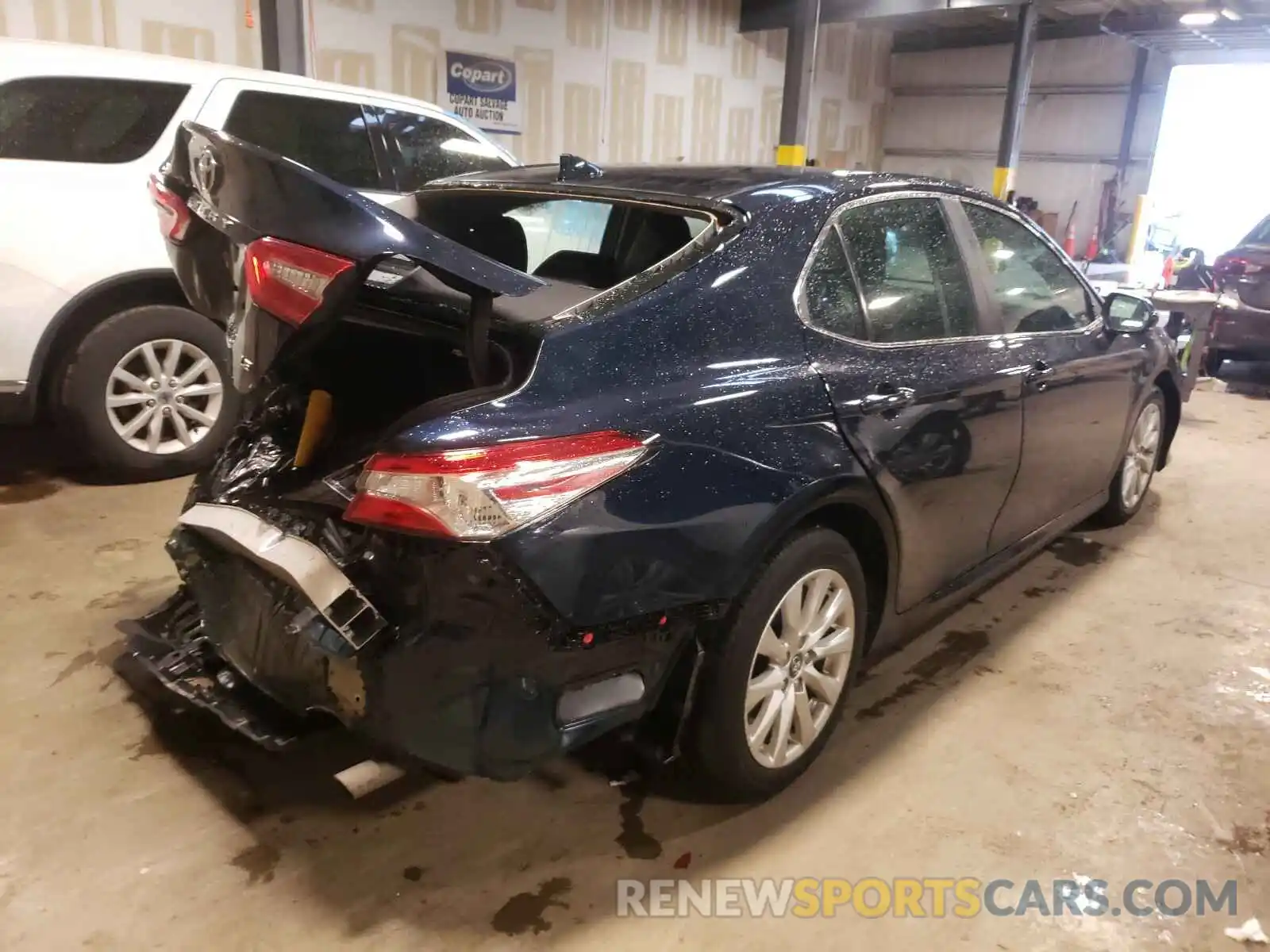 4 Photograph of a damaged car 4T1B11HK7KU261490 TOYOTA CAMRY 2019