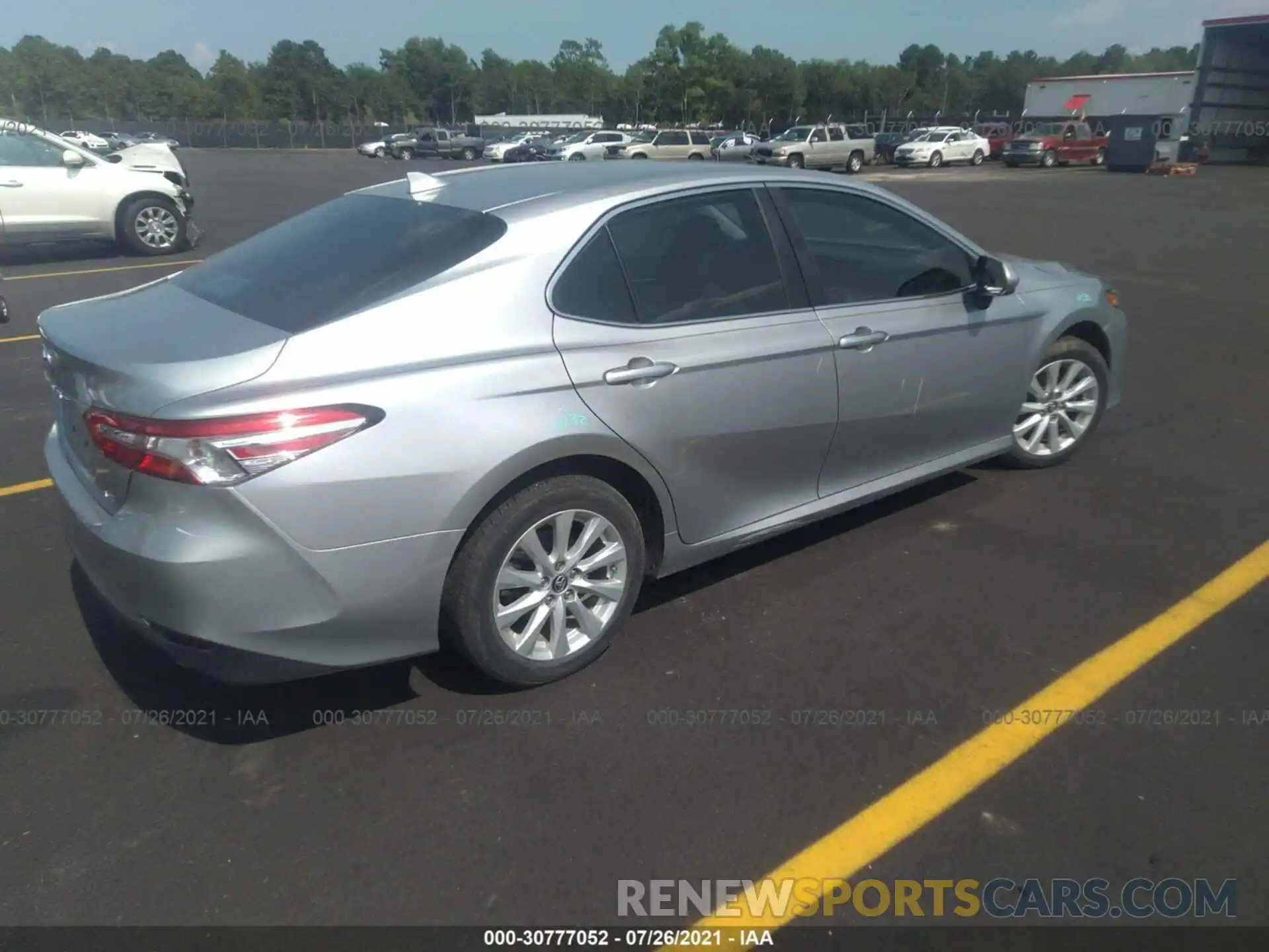 4 Photograph of a damaged car 4T1B11HK7KU265281 TOYOTA CAMRY 2019