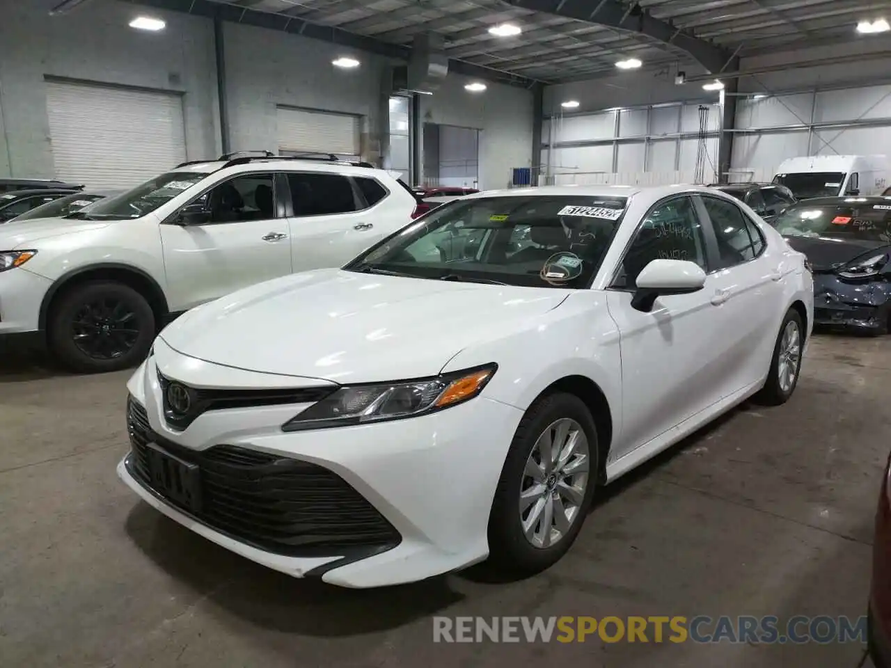 2 Photograph of a damaged car 4T1B11HK7KU267001 TOYOTA CAMRY 2019