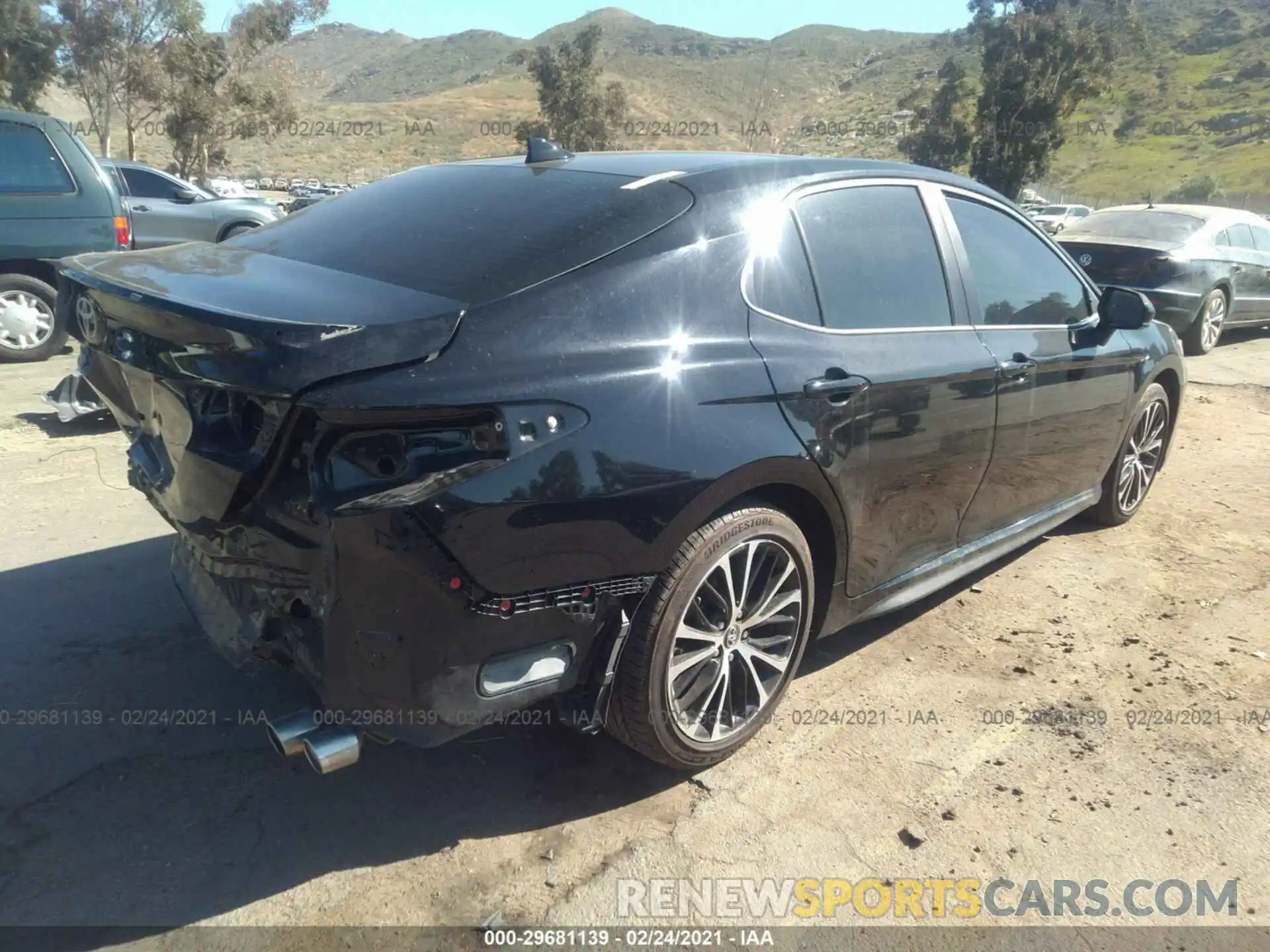 4 Photograph of a damaged car 4T1B11HK7KU274921 TOYOTA CAMRY 2019