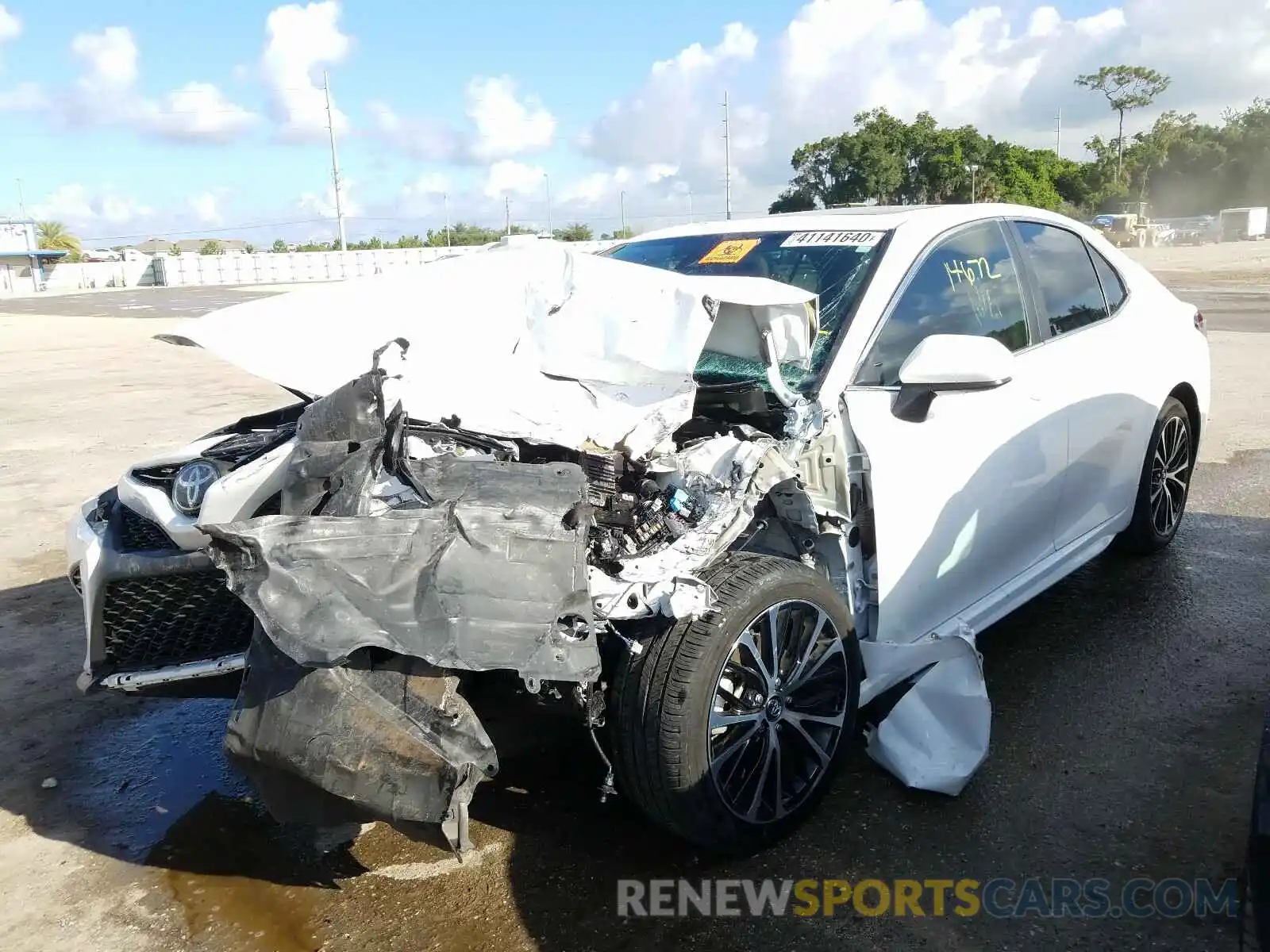 2 Photograph of a damaged car 4T1B11HK7KU275101 TOYOTA CAMRY 2019