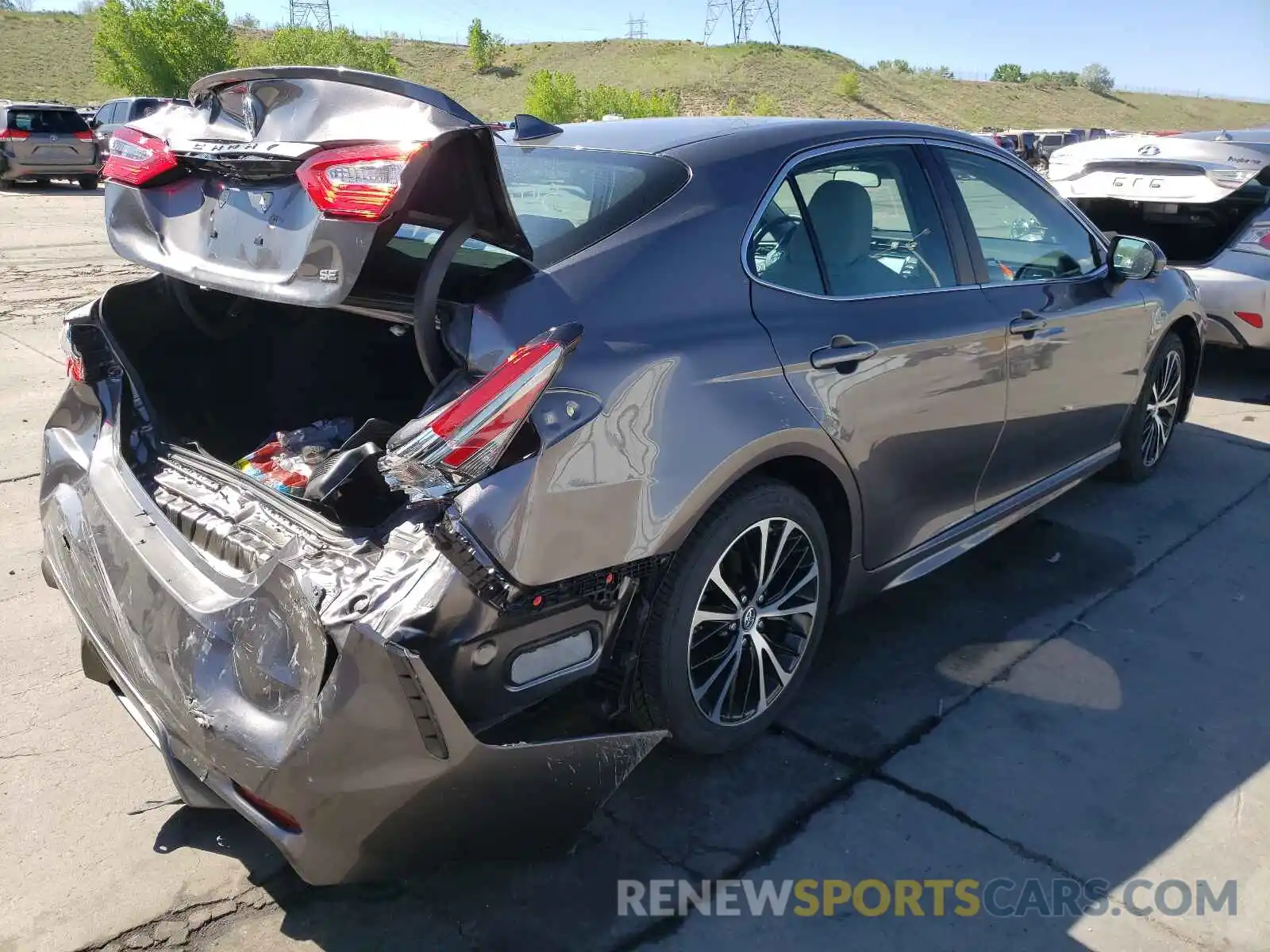 4 Photograph of a damaged car 4T1B11HK7KU277141 TOYOTA CAMRY 2019