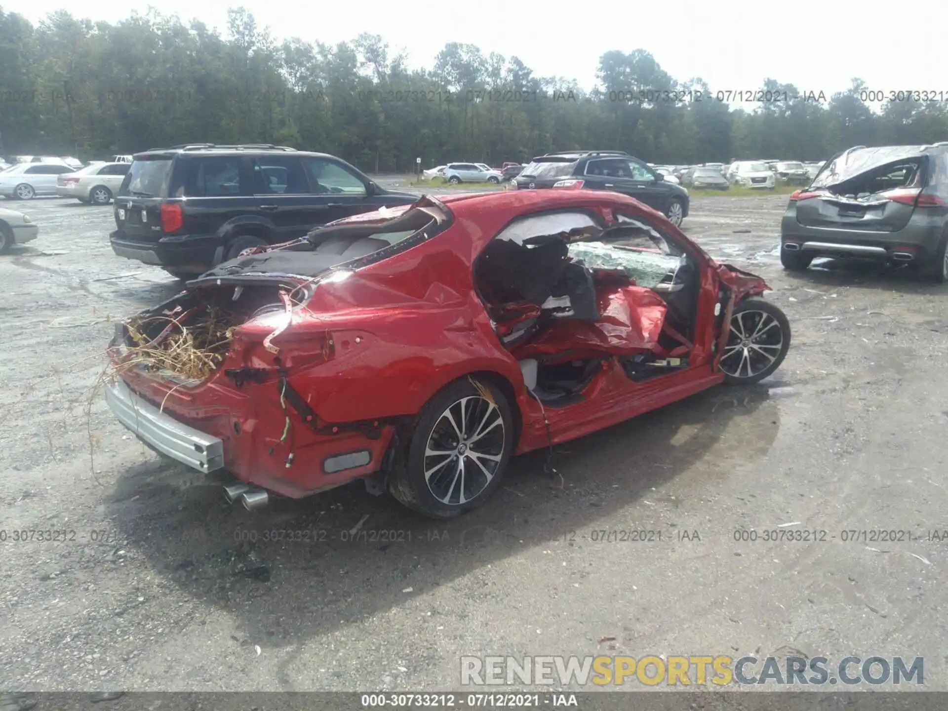 4 Photograph of a damaged car 4T1B11HK7KU282646 TOYOTA CAMRY 2019