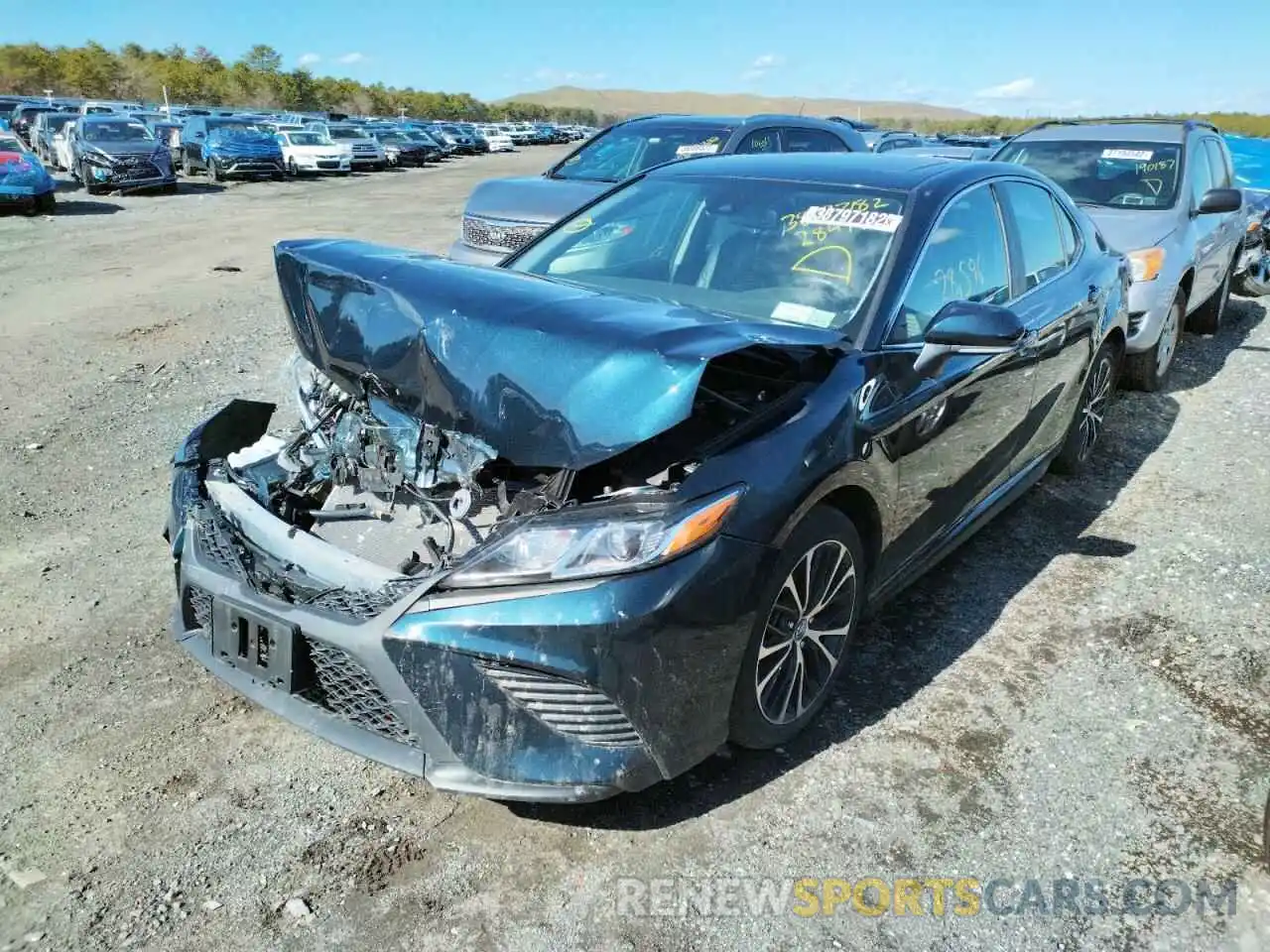 2 Photograph of a damaged car 4T1B11HK7KU284980 TOYOTA CAMRY 2019