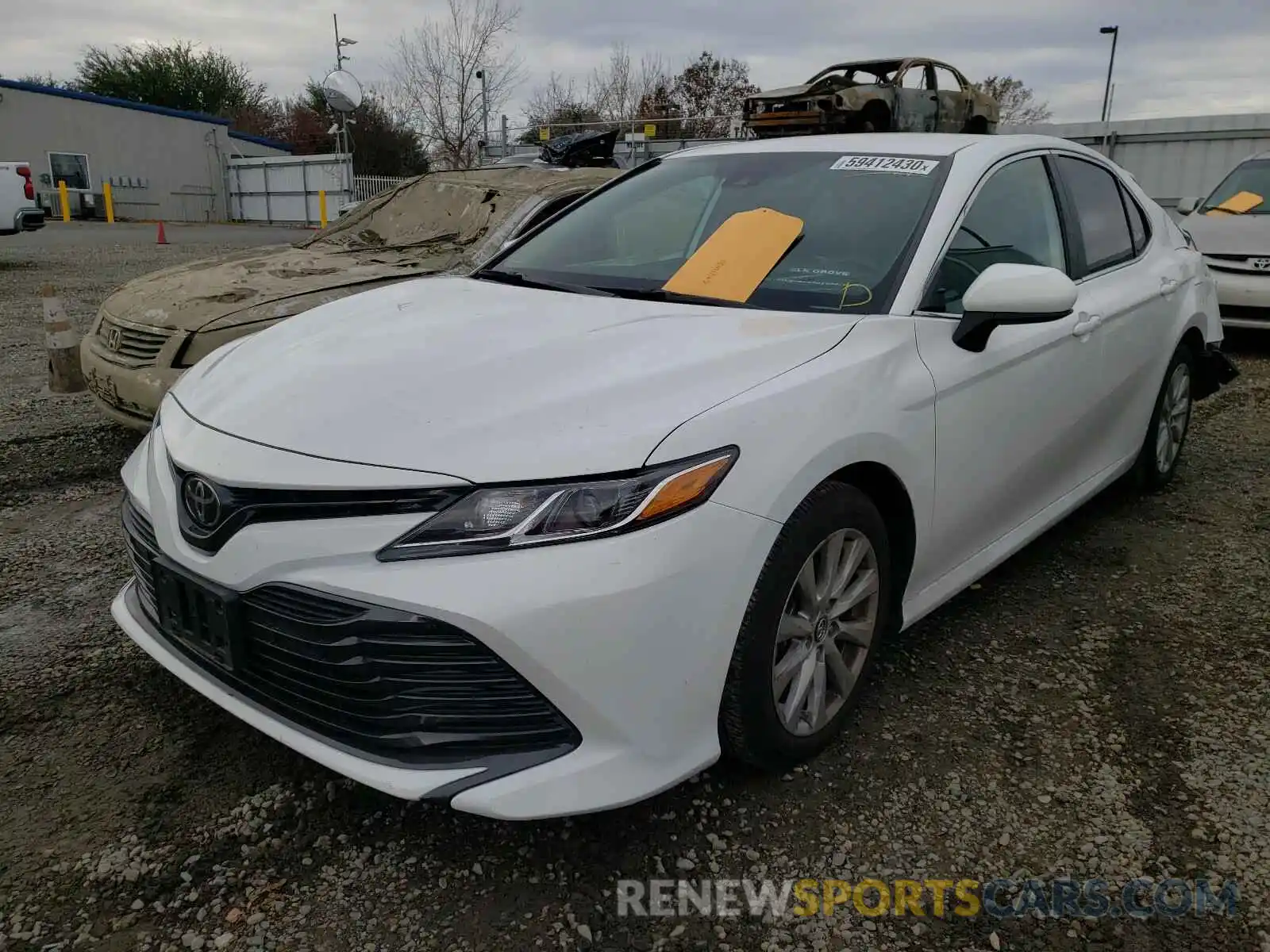 2 Photograph of a damaged car 4T1B11HK7KU287023 TOYOTA CAMRY 2019