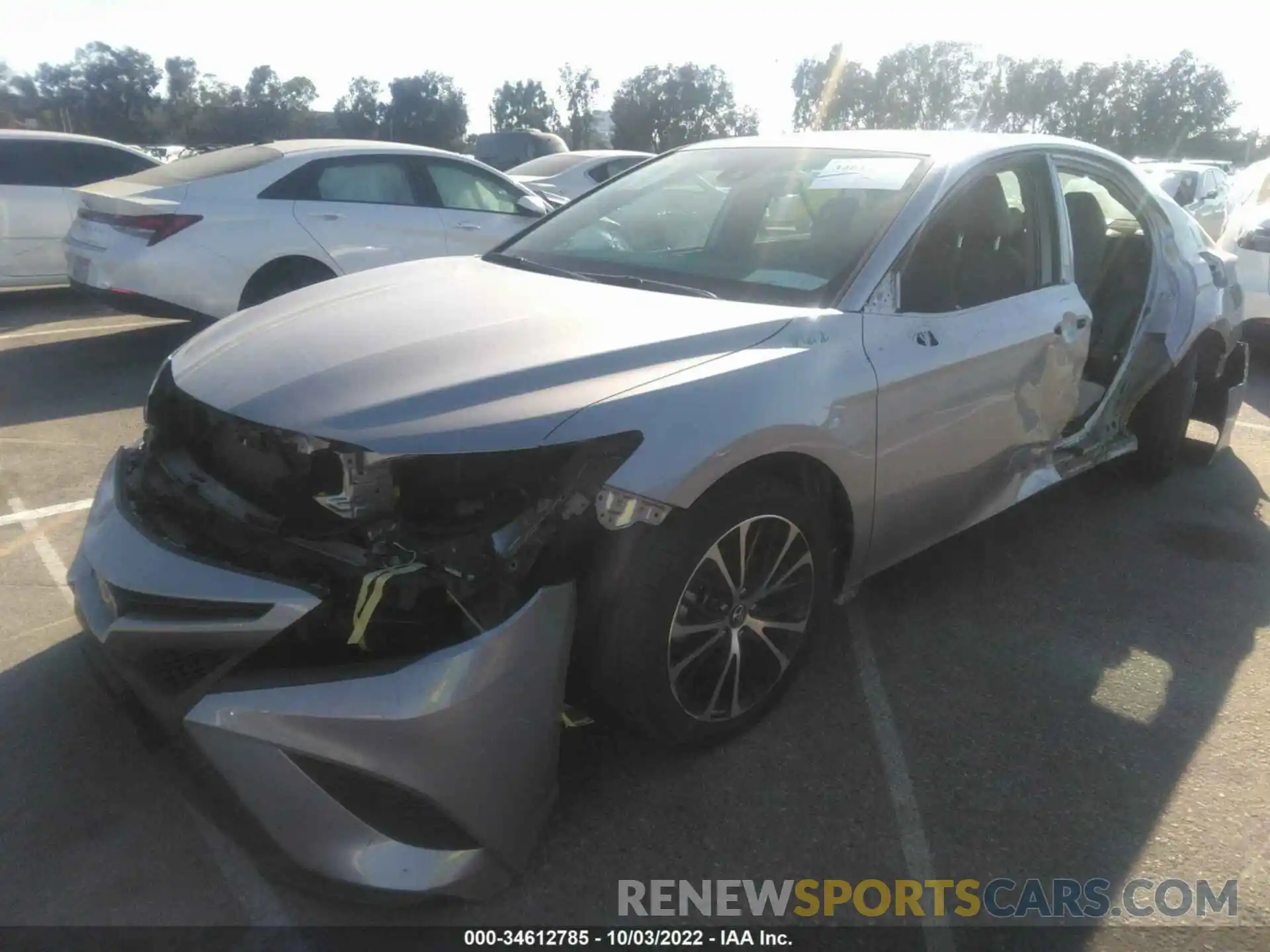 2 Photograph of a damaged car 4T1B11HK7KU297051 TOYOTA CAMRY 2019