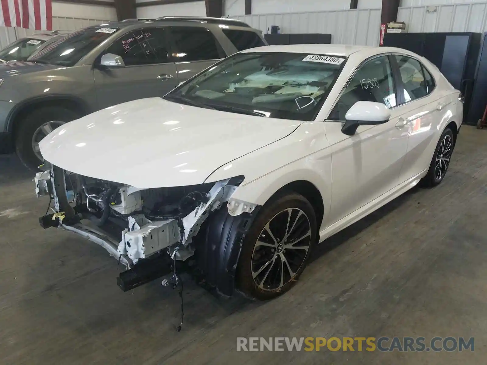 2 Photograph of a damaged car 4T1B11HK7KU680990 TOYOTA CAMRY 2019