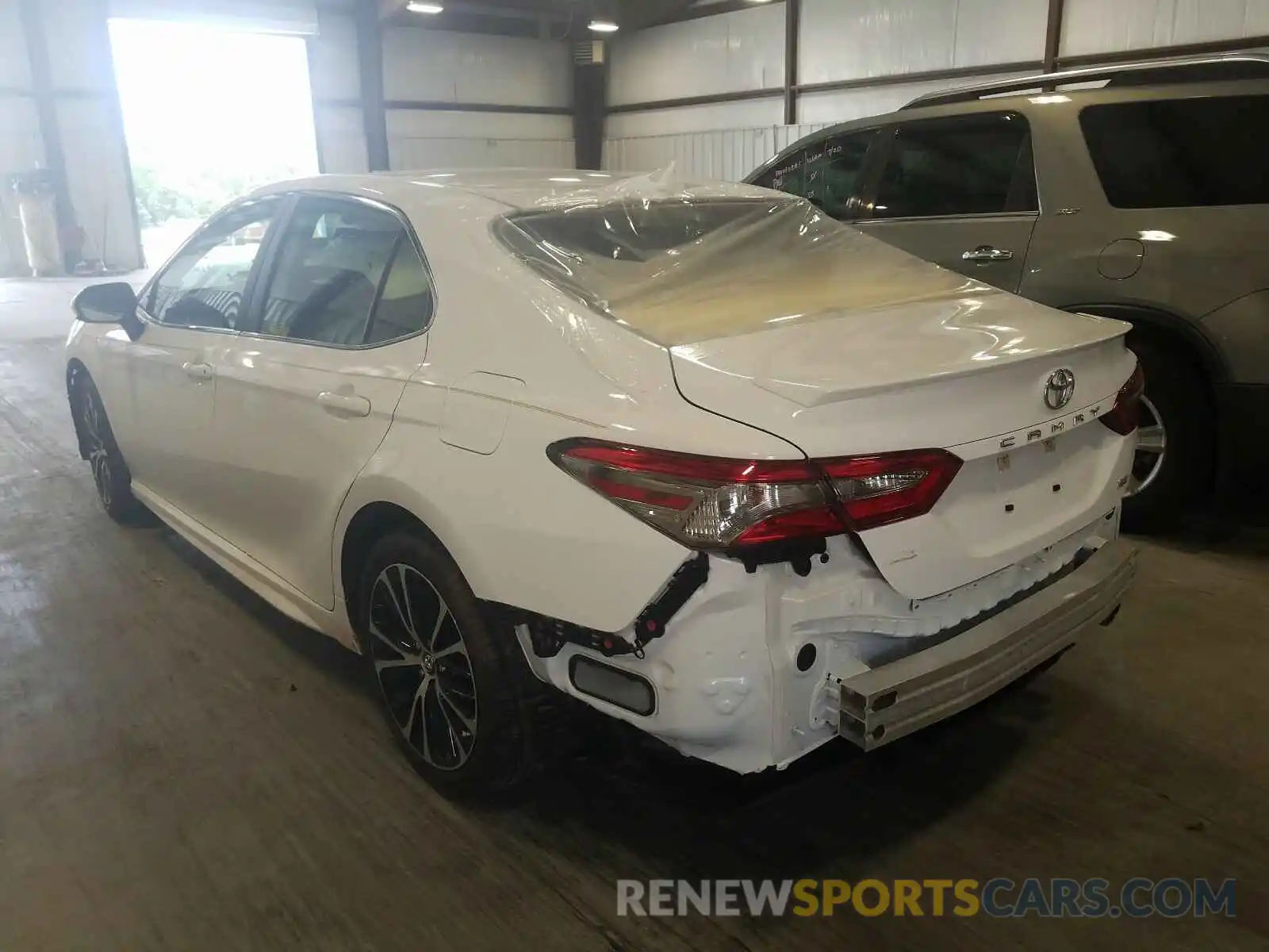 3 Photograph of a damaged car 4T1B11HK7KU680990 TOYOTA CAMRY 2019