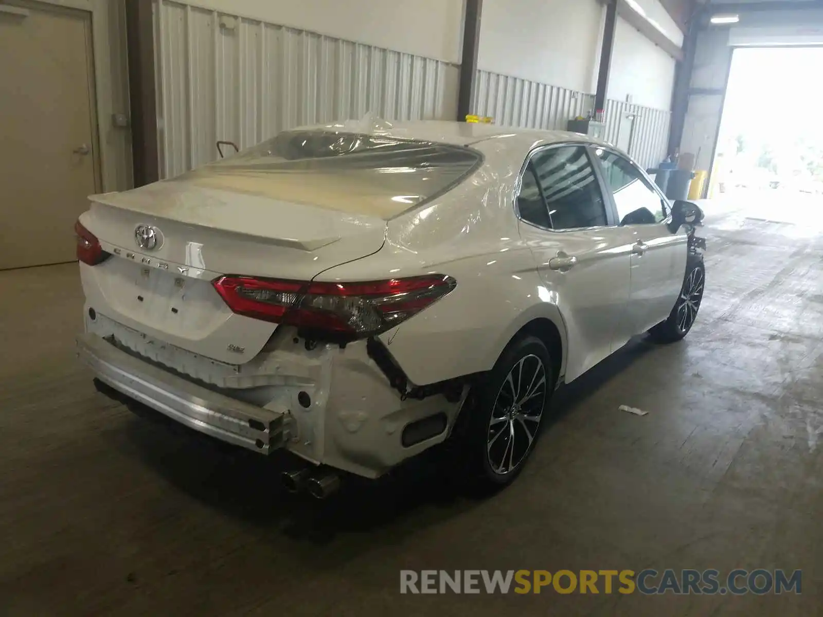 4 Photograph of a damaged car 4T1B11HK7KU680990 TOYOTA CAMRY 2019