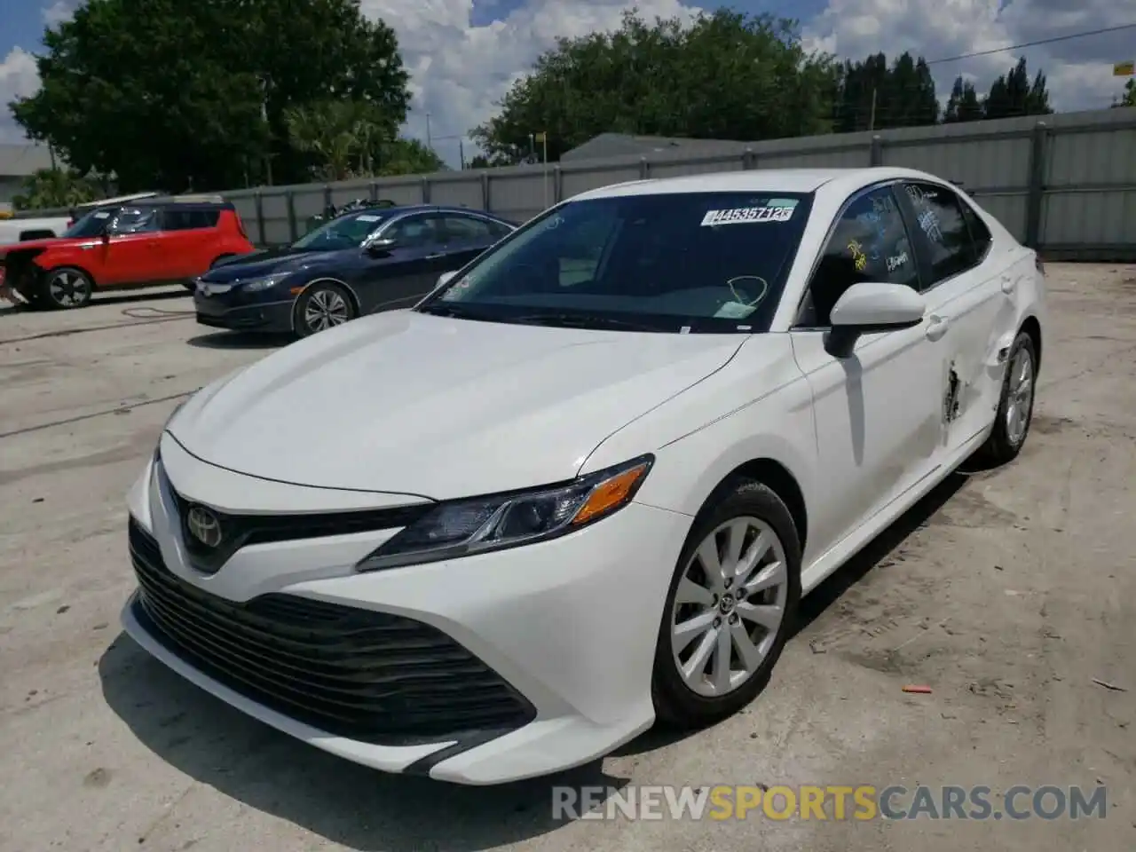 2 Photograph of a damaged car 4T1B11HK7KU681881 TOYOTA CAMRY 2019