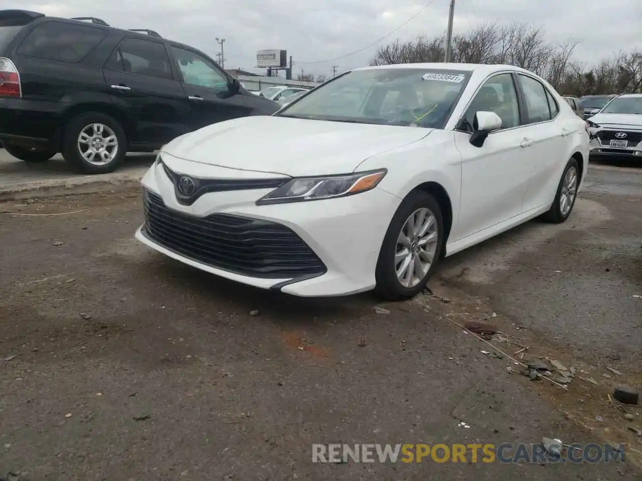 2 Photograph of a damaged car 4T1B11HK7KU683856 TOYOTA CAMRY 2019