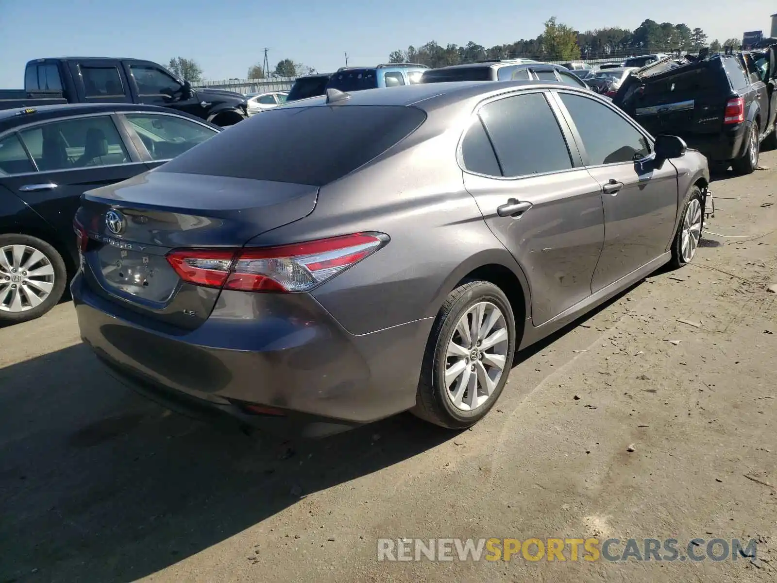 4 Photograph of a damaged car 4T1B11HK7KU687681 TOYOTA CAMRY 2019