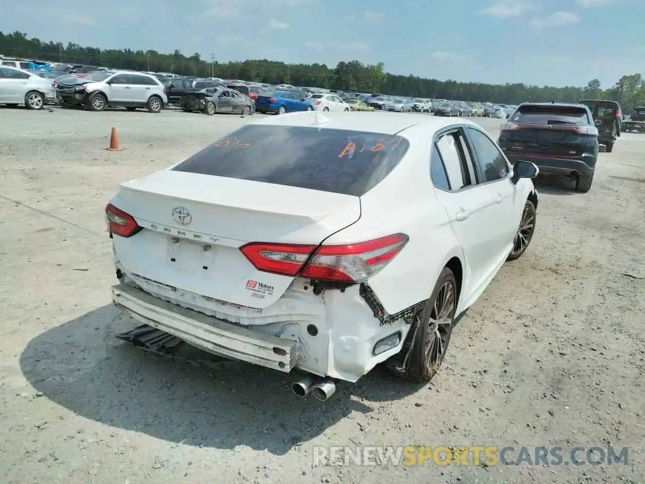 4 Photograph of a damaged car 4T1B11HK7KU687910 TOYOTA CAMRY 2019