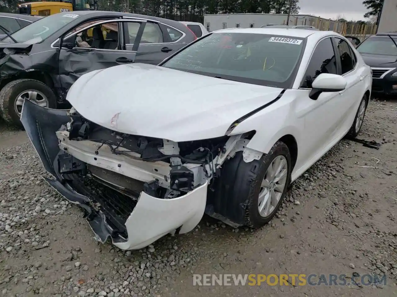 2 Photograph of a damaged car 4T1B11HK7KU689205 TOYOTA CAMRY 2019