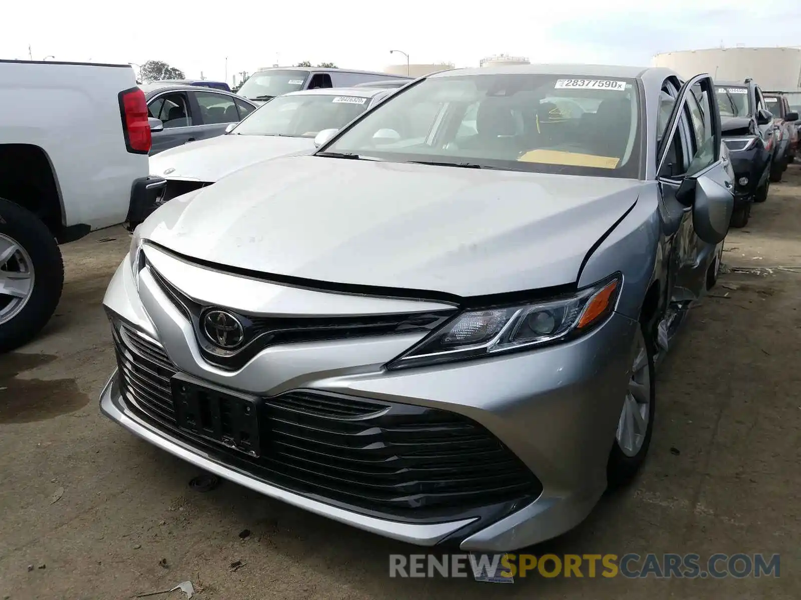 2 Photograph of a damaged car 4T1B11HK7KU690483 TOYOTA CAMRY 2019