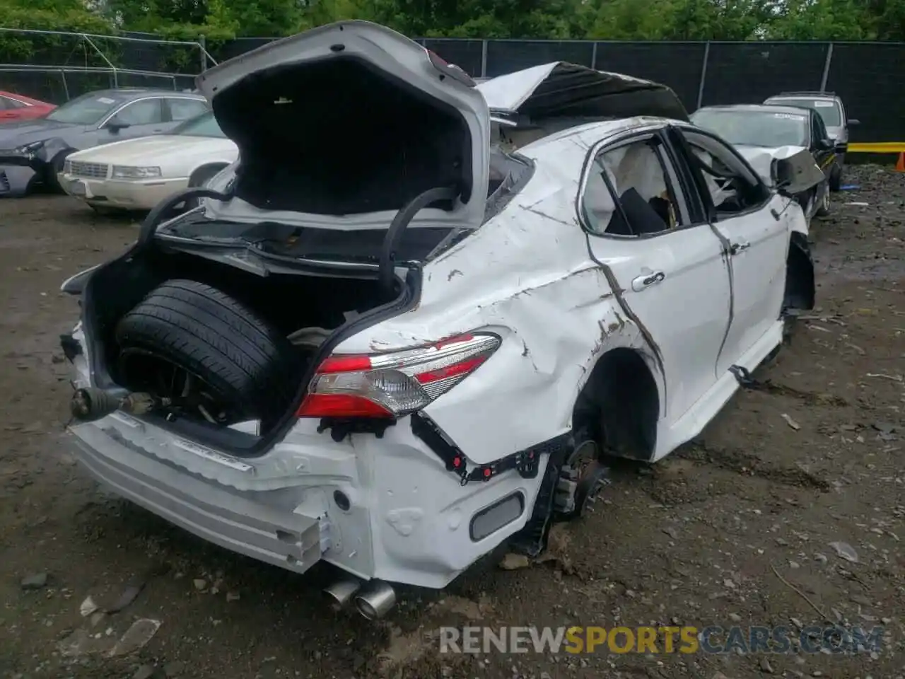 4 Photograph of a damaged car 4T1B11HK7KU690631 TOYOTA CAMRY 2019