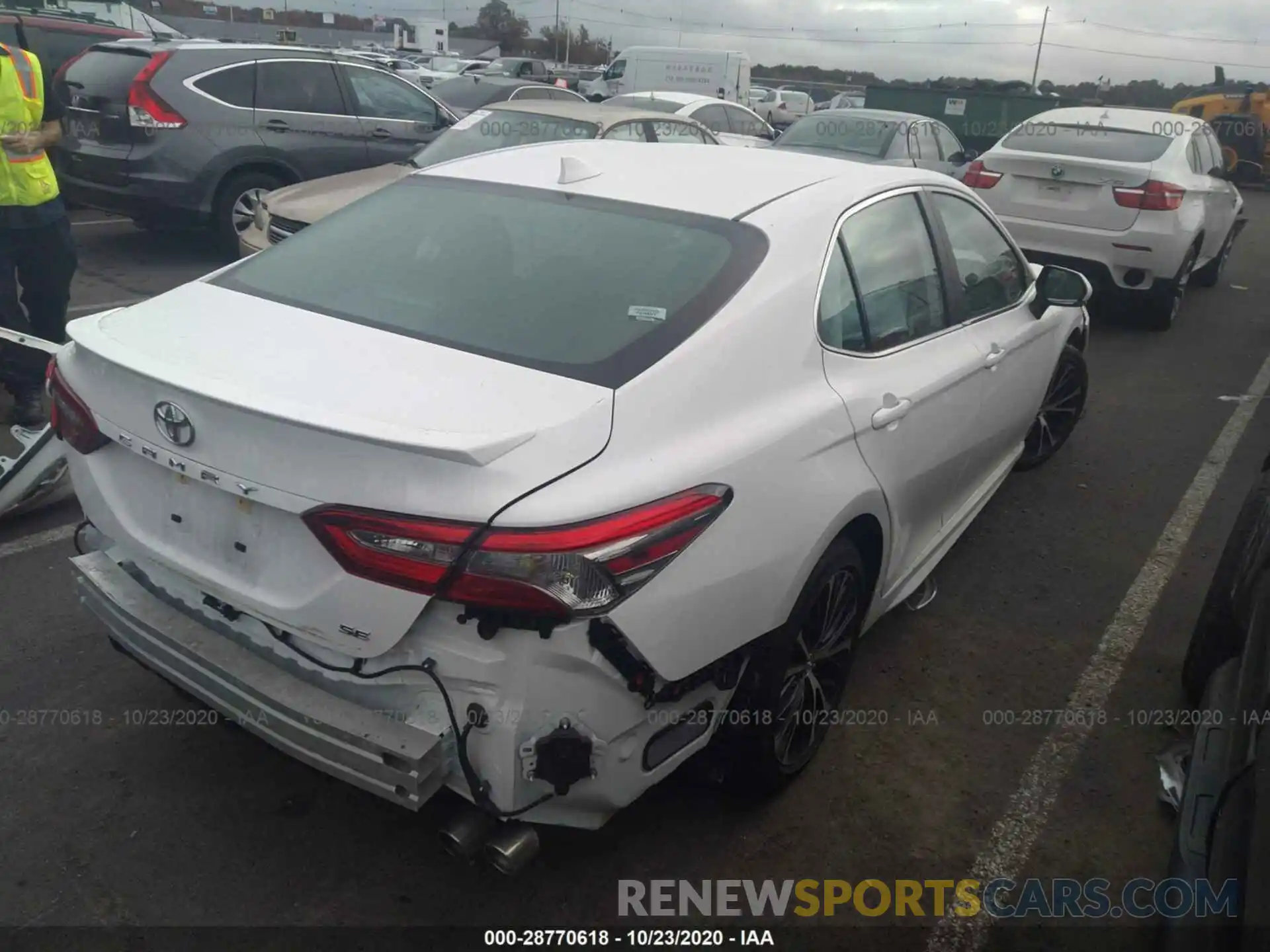 4 Photograph of a damaged car 4T1B11HK7KU692623 TOYOTA CAMRY 2019