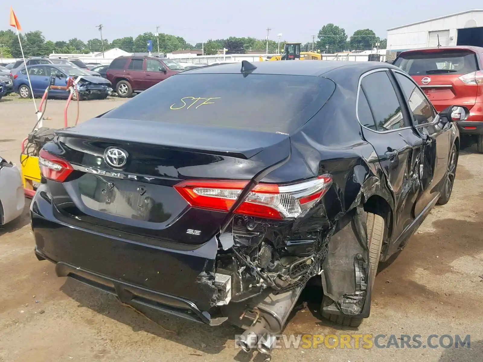 4 Photograph of a damaged car 4T1B11HK7KU692816 TOYOTA CAMRY 2019