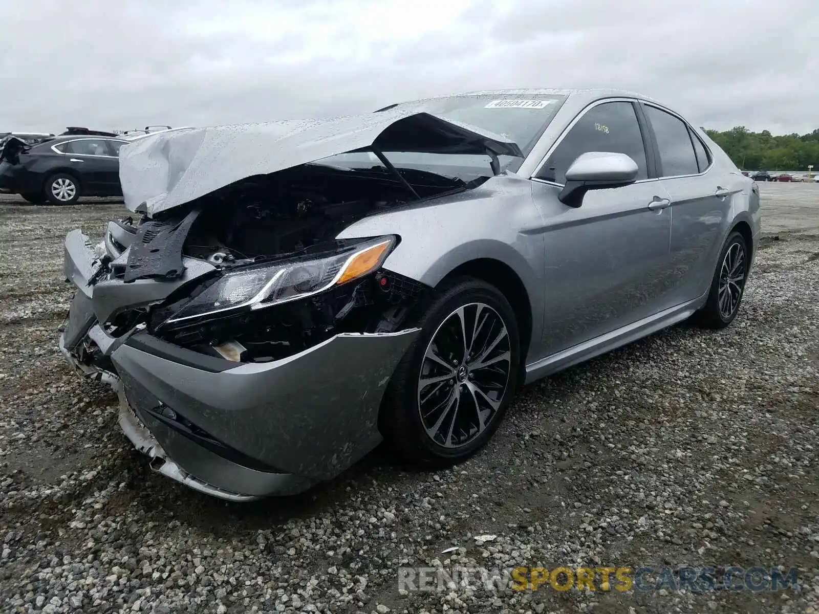 2 Photograph of a damaged car 4T1B11HK7KU694906 TOYOTA CAMRY 2019