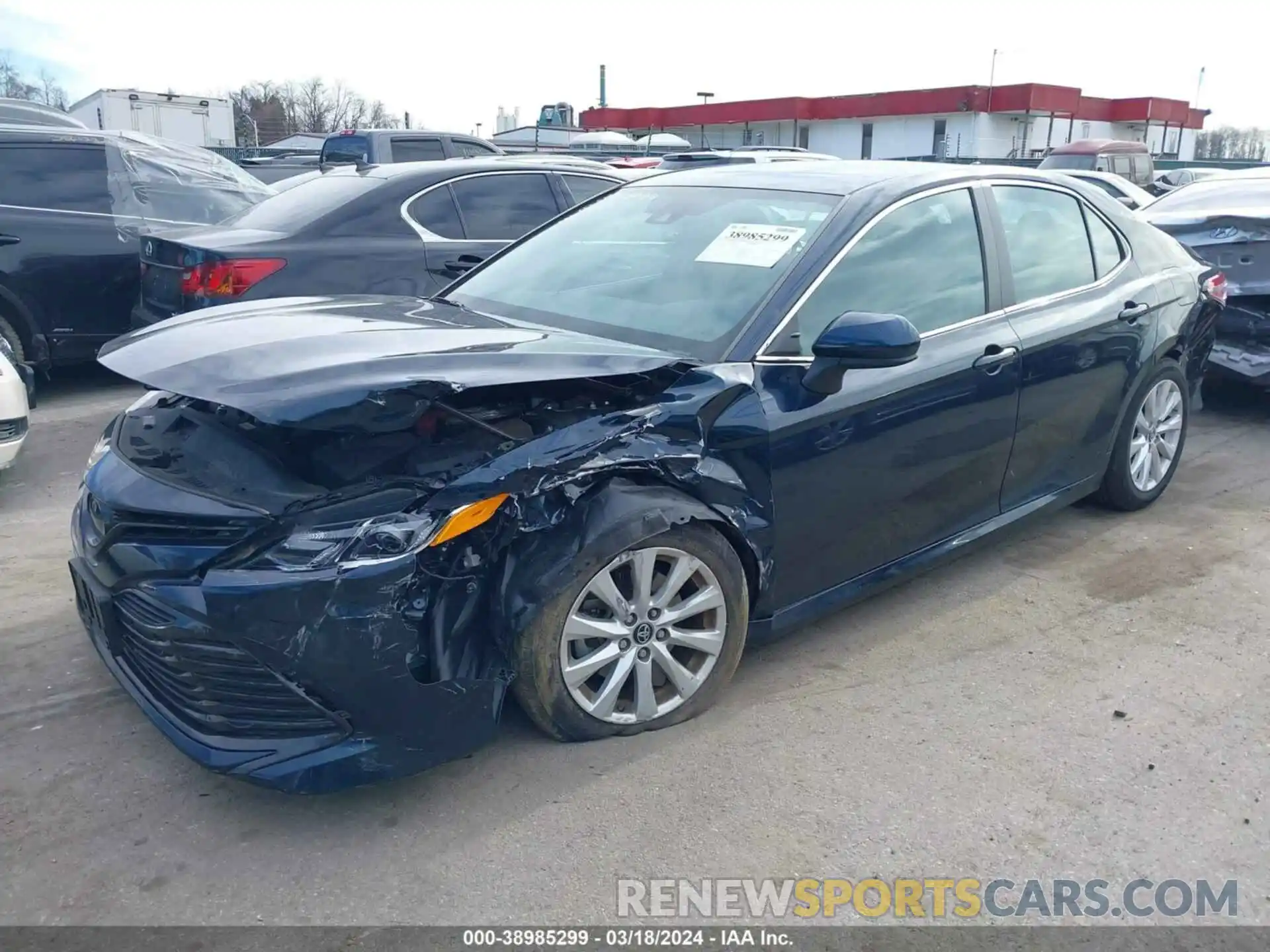 2 Photograph of a damaged car 4T1B11HK7KU696090 TOYOTA CAMRY 2019