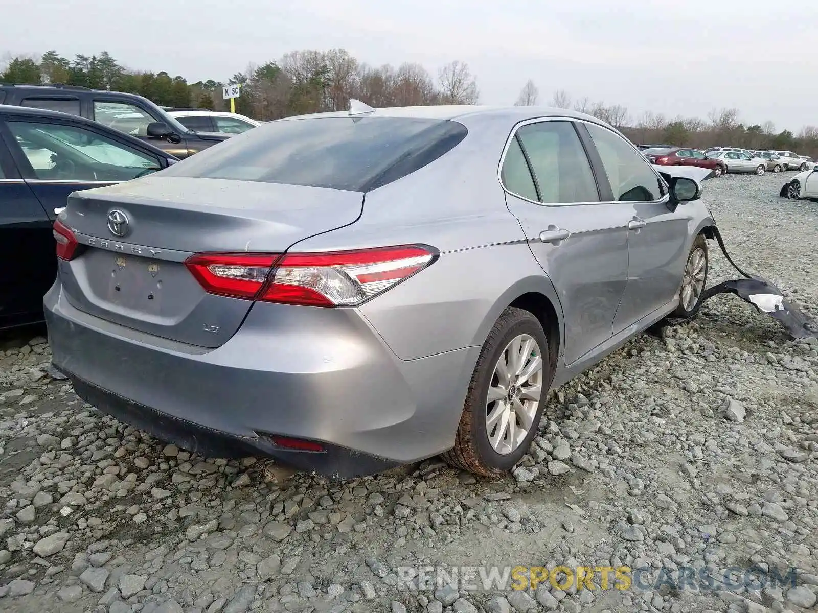 4 Photograph of a damaged car 4T1B11HK7KU696395 TOYOTA CAMRY 2019