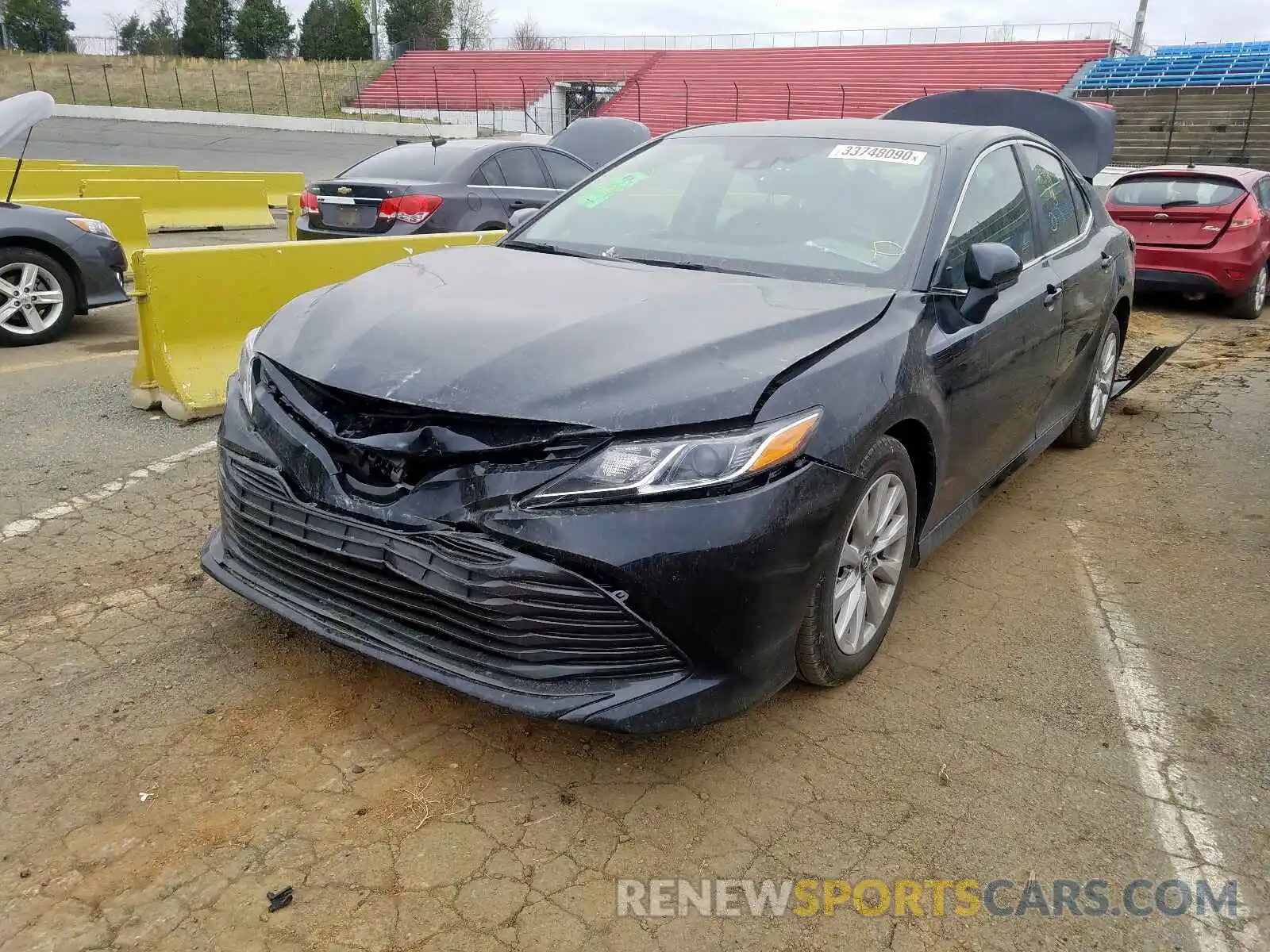 2 Photograph of a damaged car 4T1B11HK7KU696994 TOYOTA CAMRY 2019