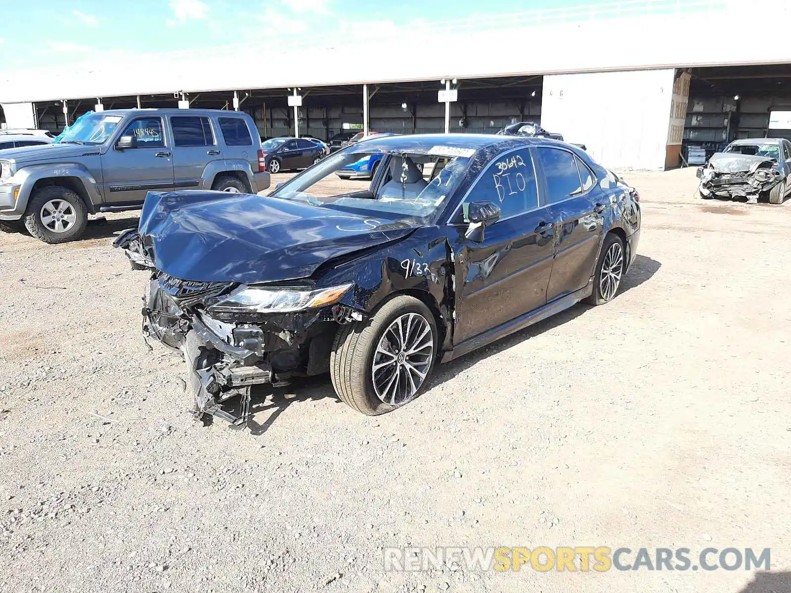 2 Photograph of a damaged car 4T1B11HK7KU697174 TOYOTA CAMRY 2019