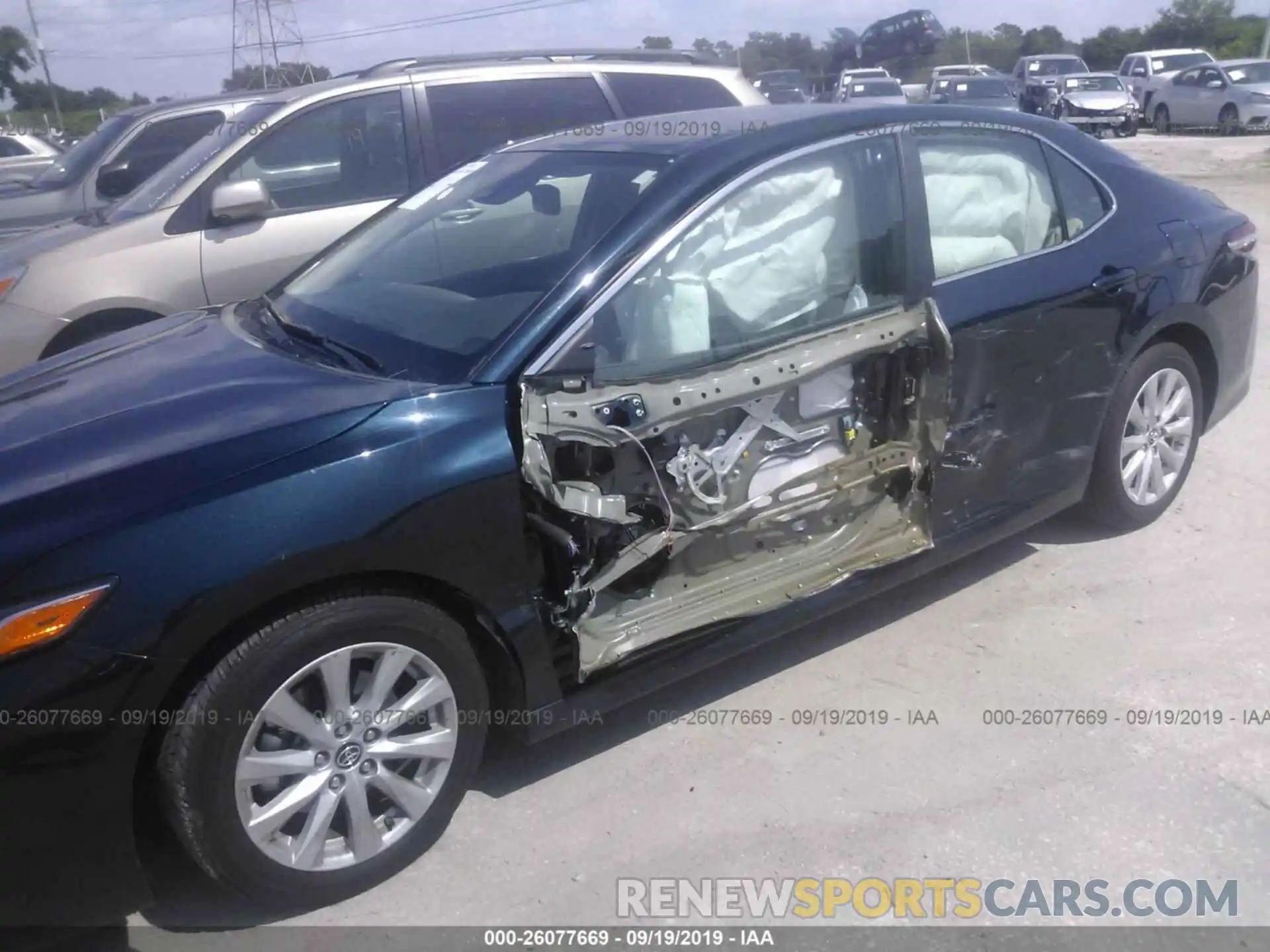 6 Photograph of a damaged car 4T1B11HK7KU697997 TOYOTA CAMRY 2019