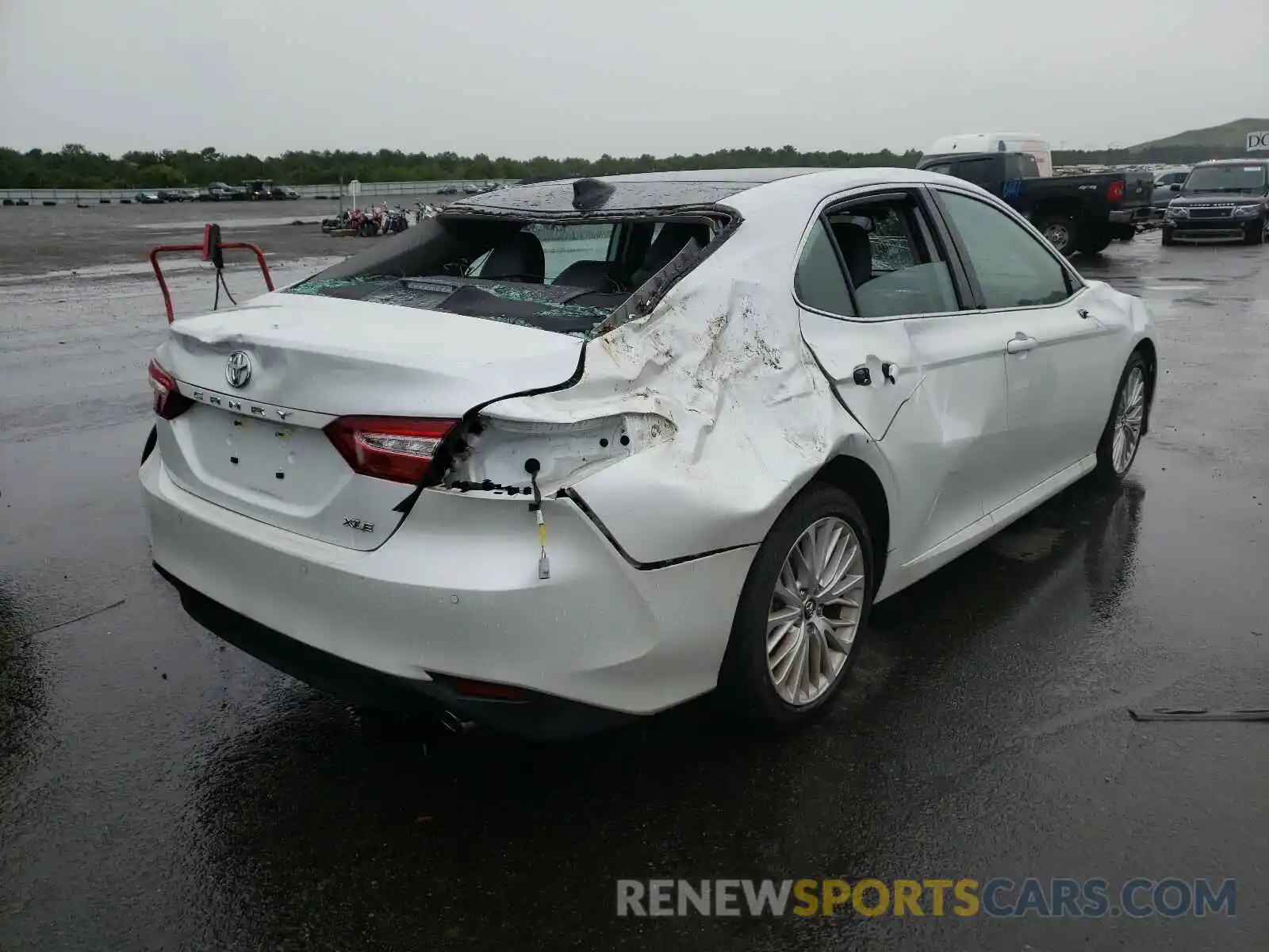 4 Photograph of a damaged car 4T1B11HK7KU699278 TOYOTA CAMRY 2019