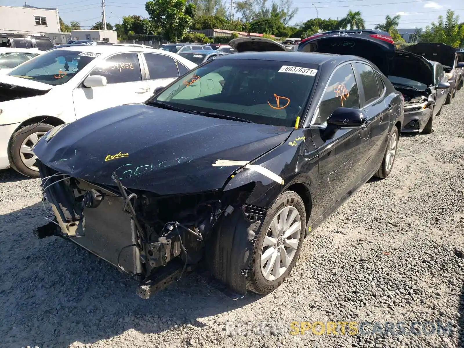 2 Photograph of a damaged car 4T1B11HK7KU701899 TOYOTA CAMRY 2019