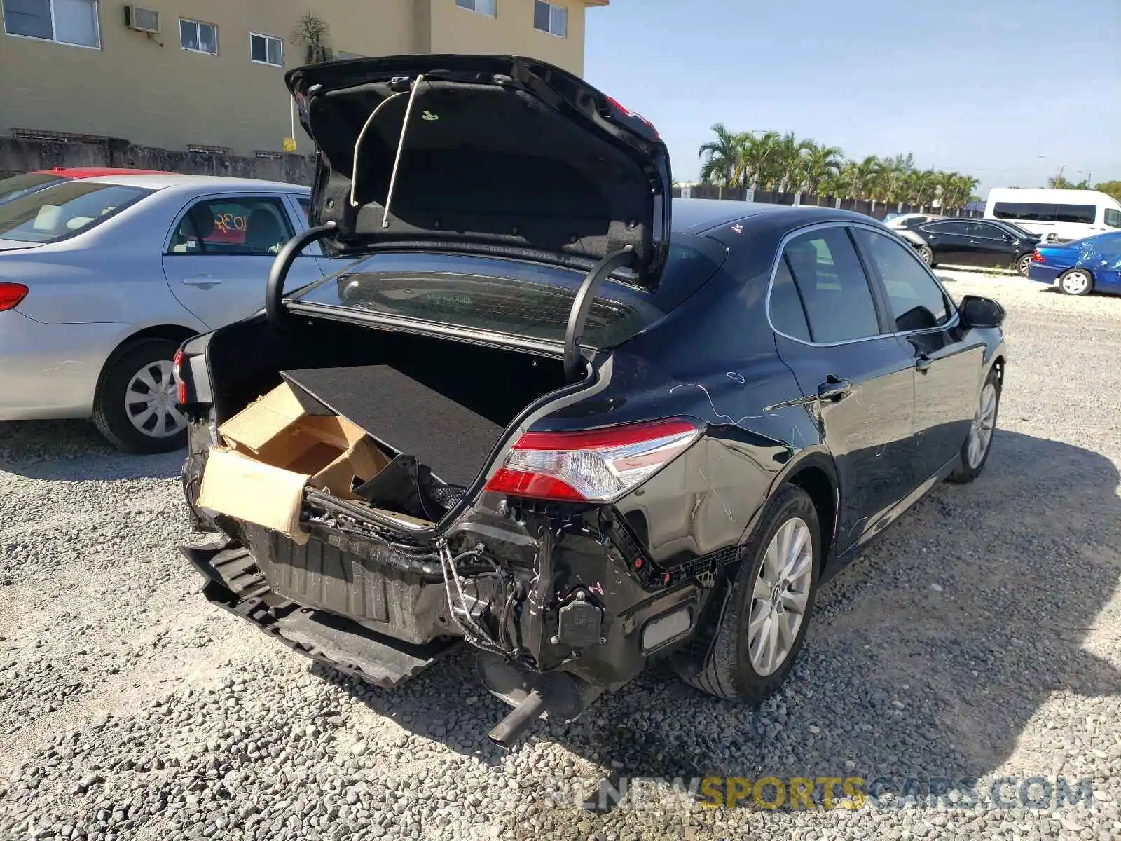 4 Photograph of a damaged car 4T1B11HK7KU701899 TOYOTA CAMRY 2019