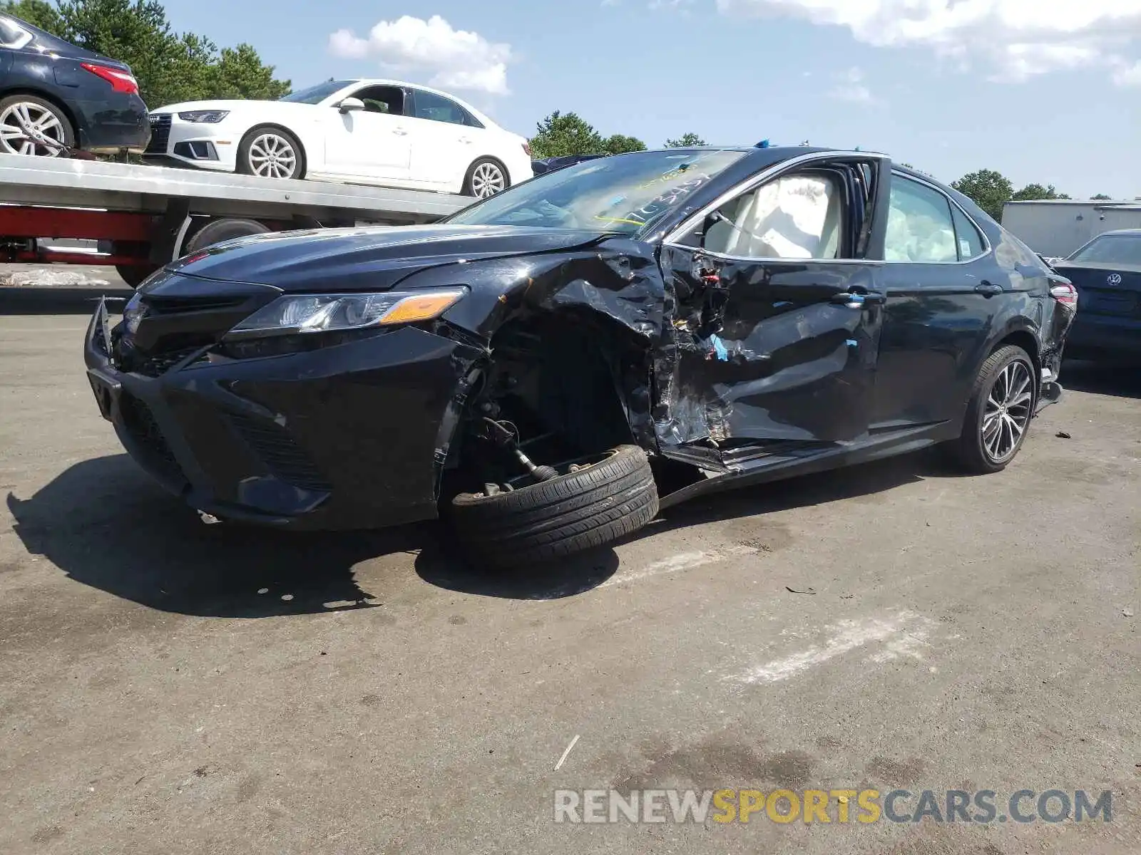 2 Photograph of a damaged car 4T1B11HK7KU703457 TOYOTA CAMRY 2019