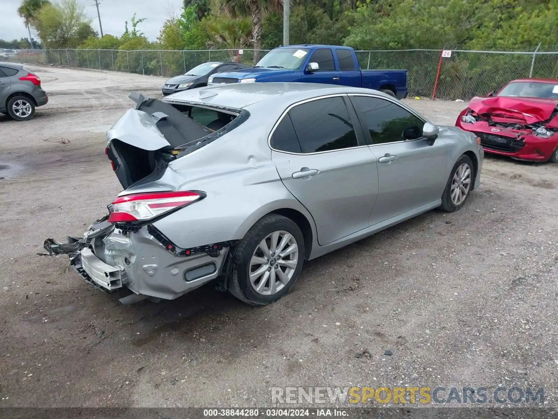 4 Photograph of a damaged car 4T1B11HK7KU703670 TOYOTA CAMRY 2019