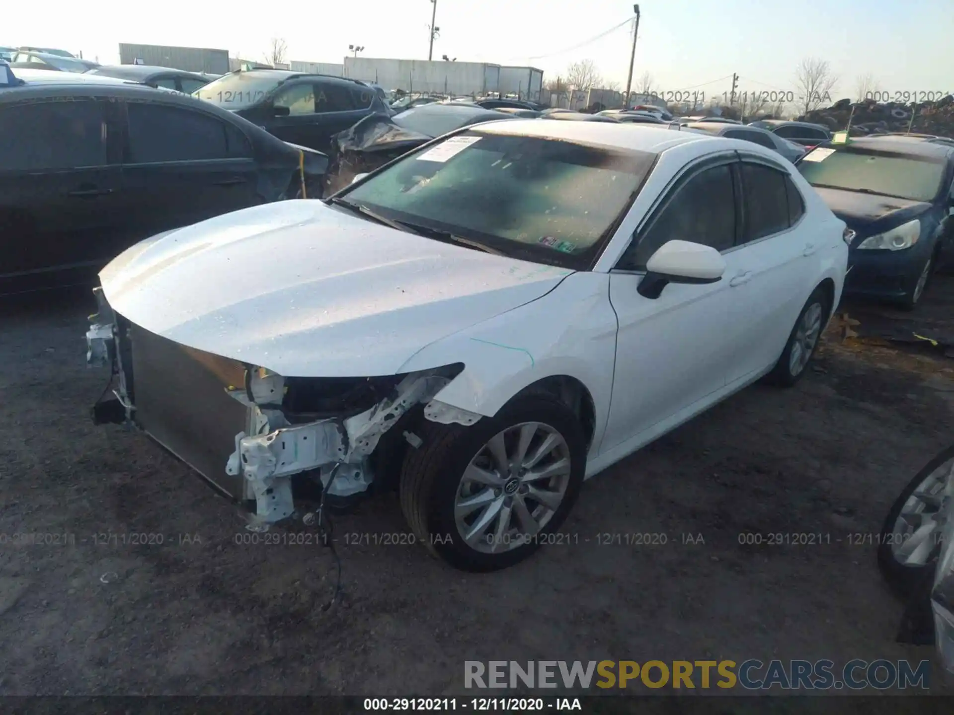 2 Photograph of a damaged car 4T1B11HK7KU704303 TOYOTA CAMRY 2019