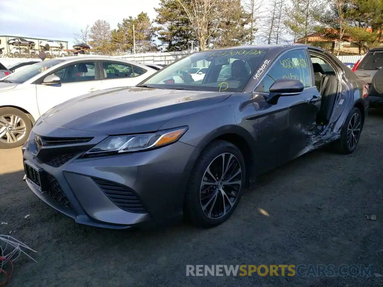 2 Photograph of a damaged car 4T1B11HK7KU705645 TOYOTA CAMRY 2019