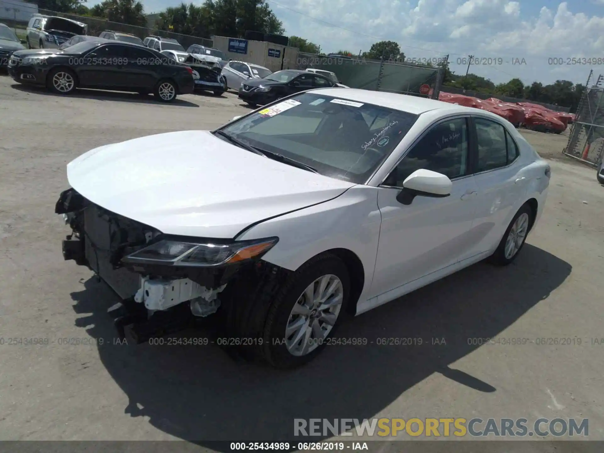 2 Photograph of a damaged car 4T1B11HK7KU707671 TOYOTA CAMRY 2019