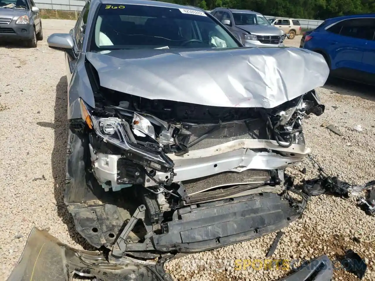 9 Photograph of a damaged car 4T1B11HK7KU709999 TOYOTA CAMRY 2019