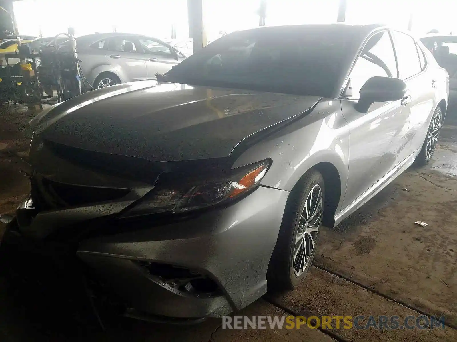 2 Photograph of a damaged car 4T1B11HK7KU710909 TOYOTA CAMRY 2019