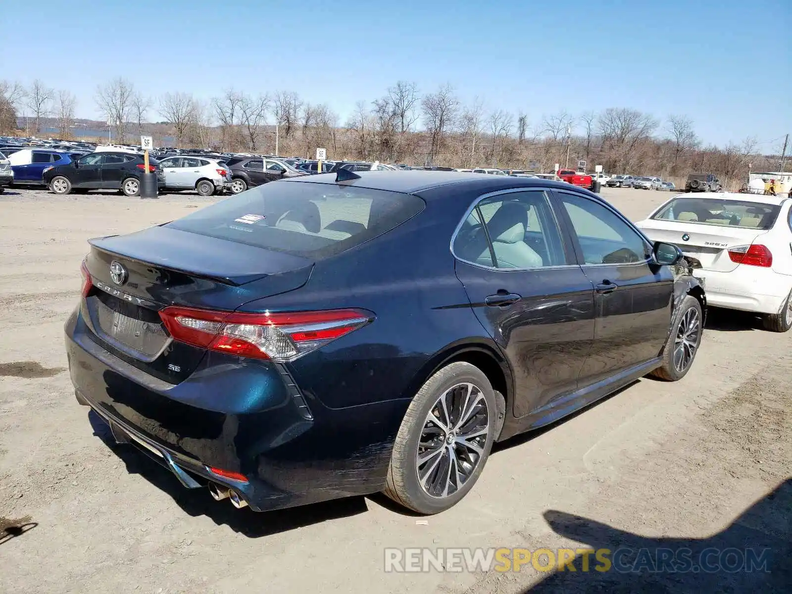 4 Photograph of a damaged car 4T1B11HK7KU713020 TOYOTA CAMRY 2019