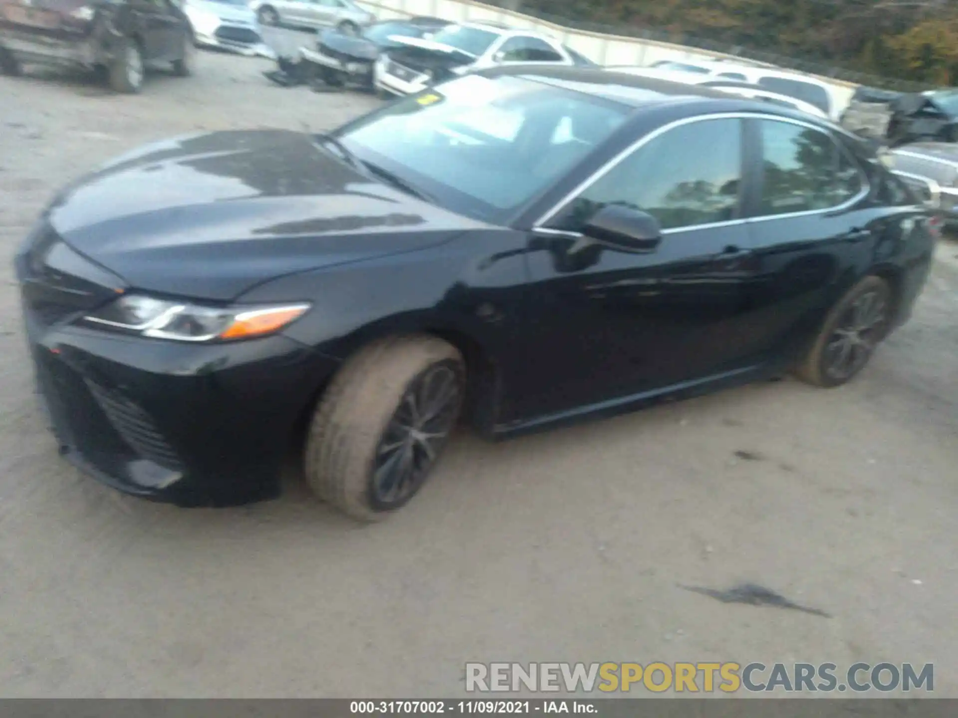 2 Photograph of a damaged car 4T1B11HK7KU713048 TOYOTA CAMRY 2019