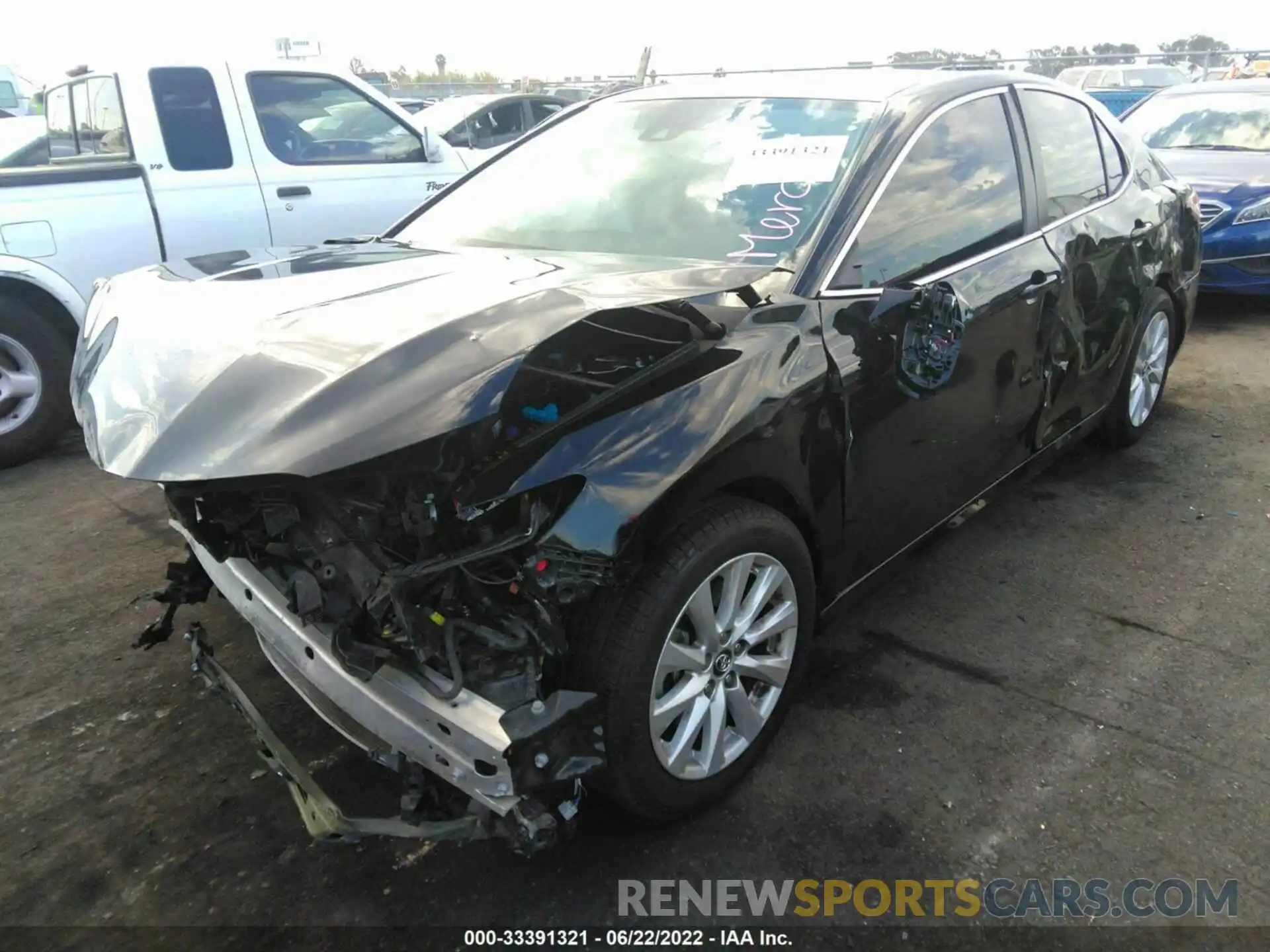 2 Photograph of a damaged car 4T1B11HK7KU713308 TOYOTA CAMRY 2019