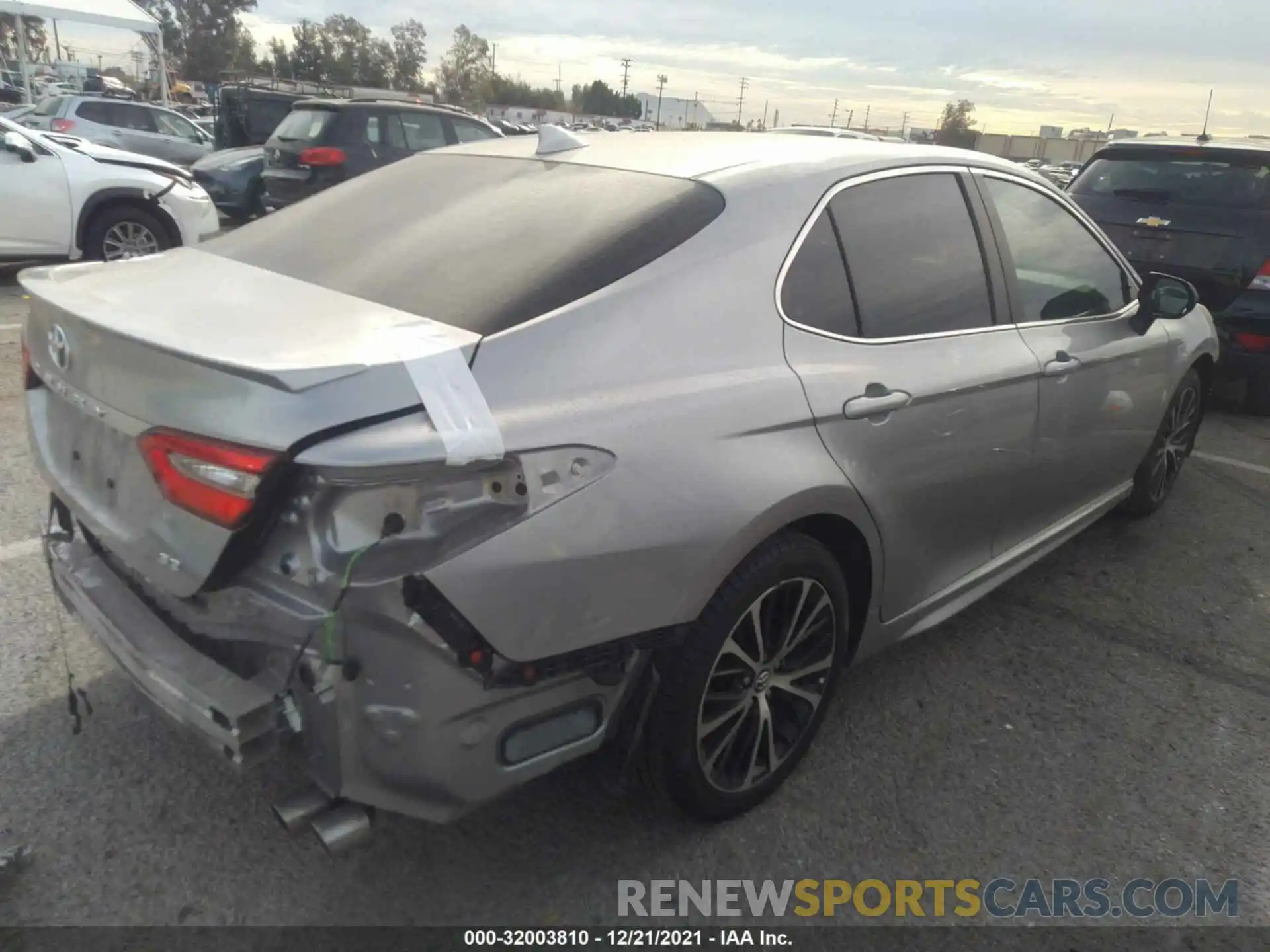 4 Photograph of a damaged car 4T1B11HK7KU713552 TOYOTA CAMRY 2019