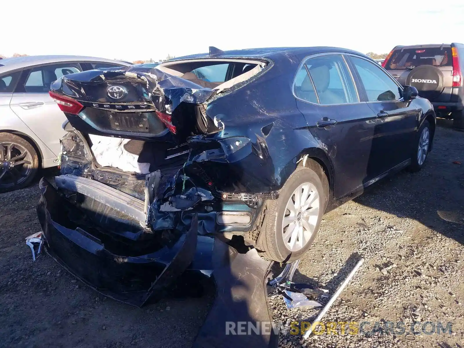 4 Photograph of a damaged car 4T1B11HK7KU715026 TOYOTA CAMRY 2019